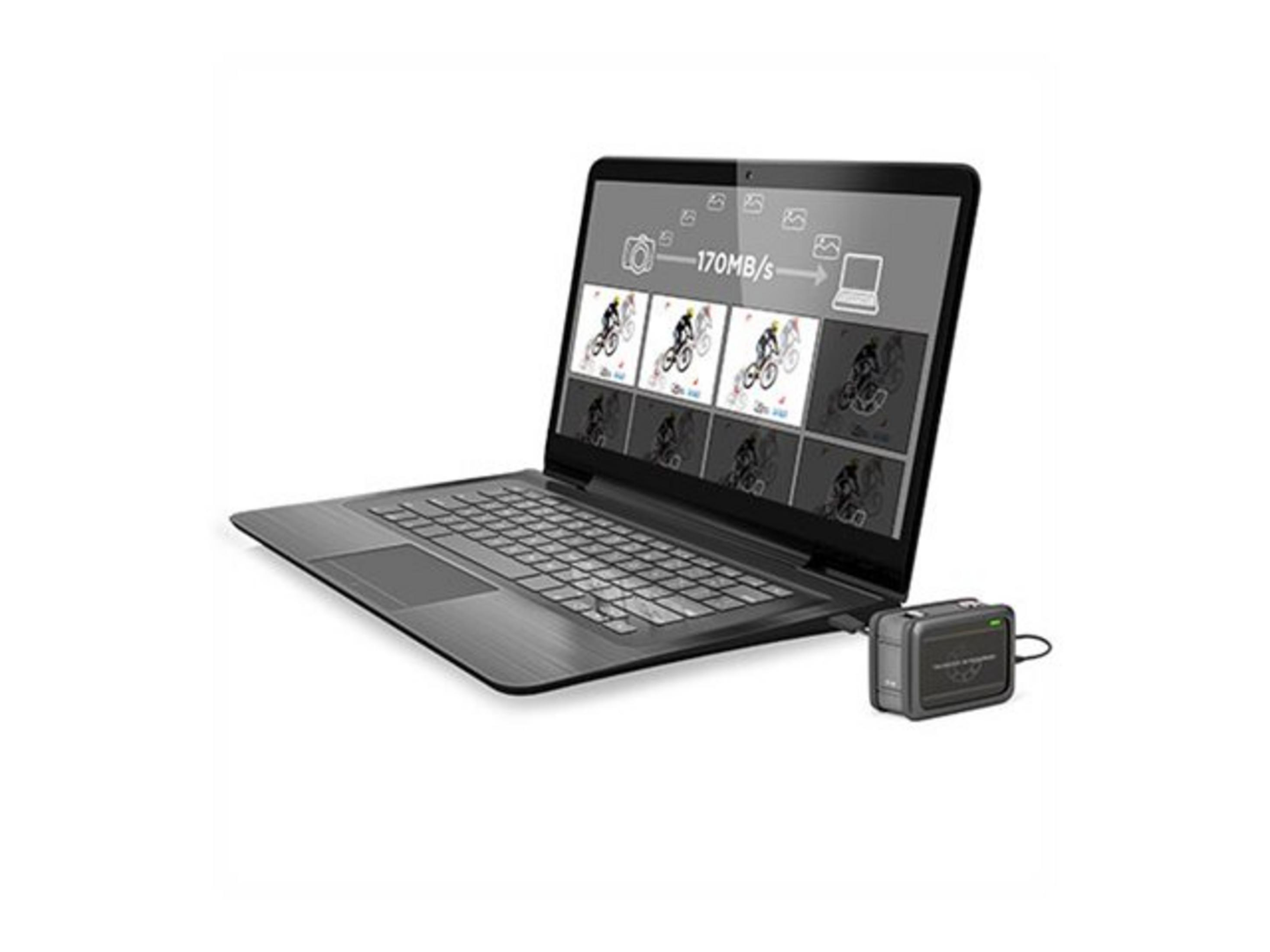 Ein Laptop zeigt eine Übertragungsrate von 170MB/s, daneben ein kleines schwarzes Gerät.