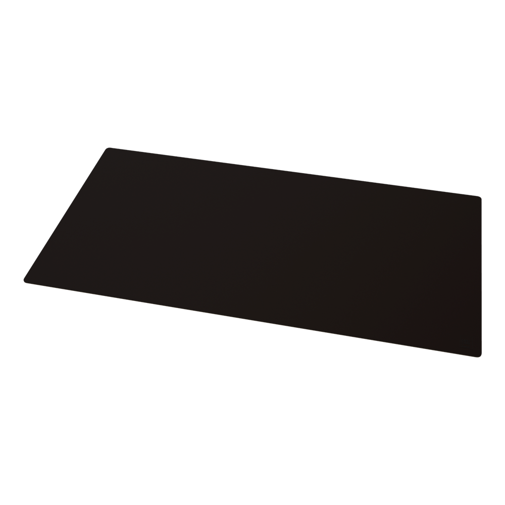Un objeto oscuro y rectangular yace sobre un fondo negro.