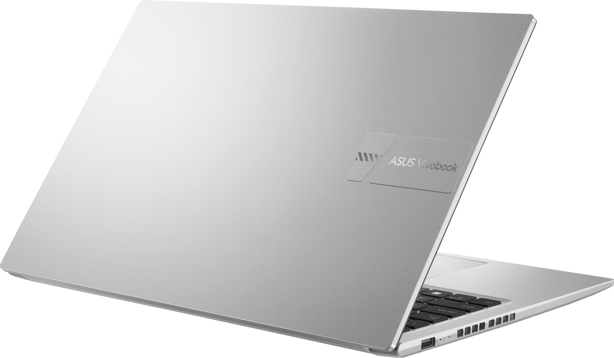 Un portátil Asus Vivobook plateado está abierto, mostrando su parte trasera y teclado.