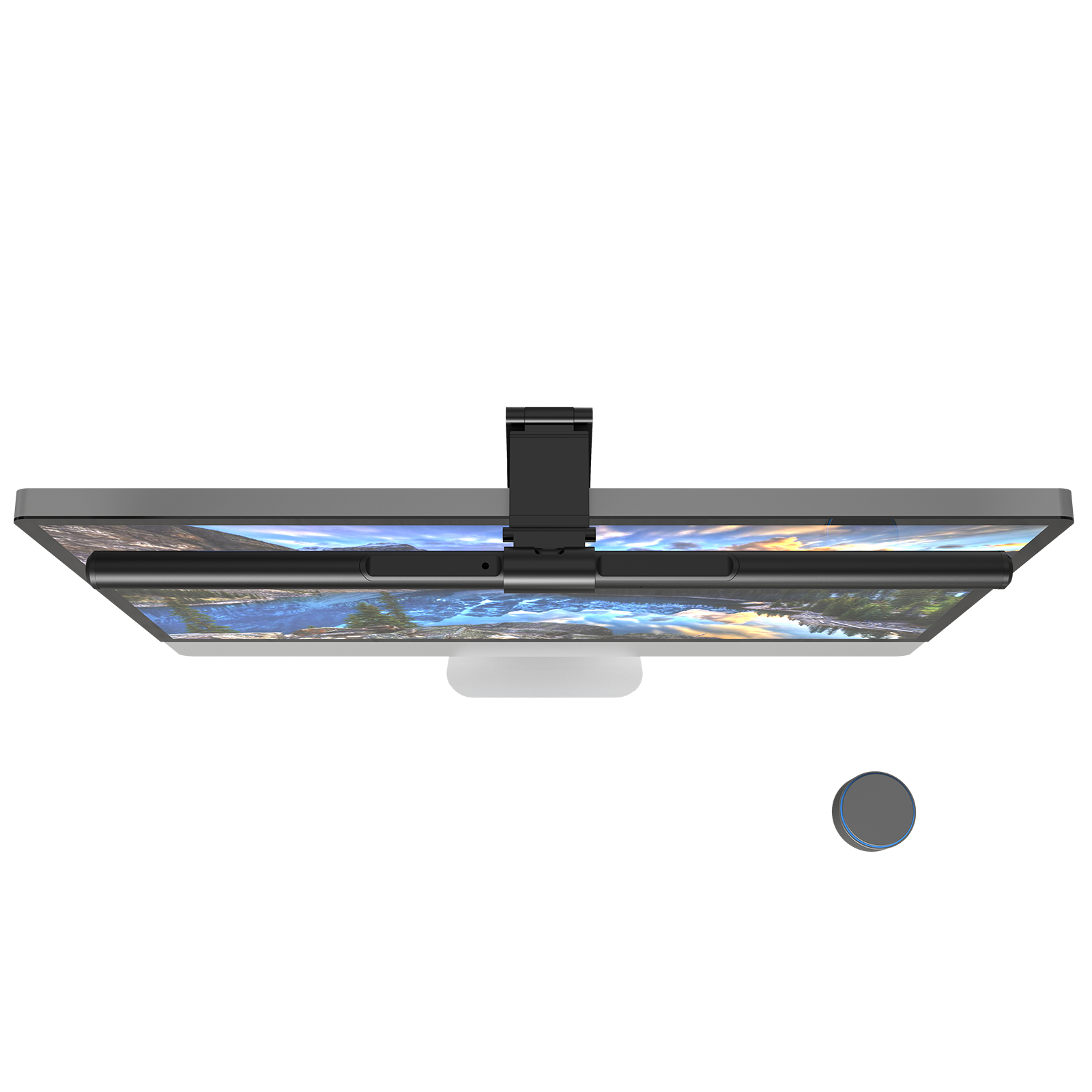 Un monitor que muestra un fondo de lago de montaña, con una cámara encima.