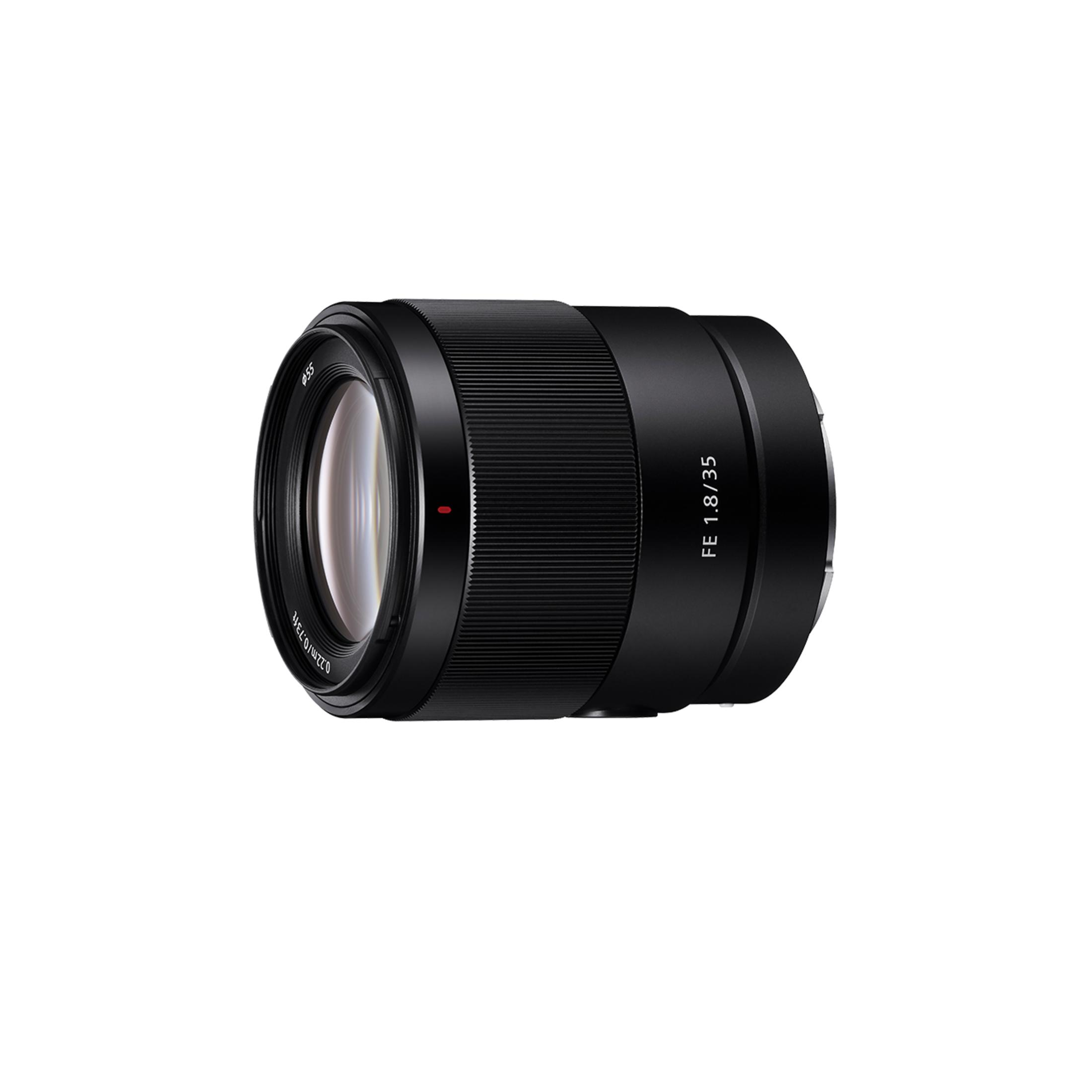 Black camera lens with FE 1.8/35 marking on a white background.