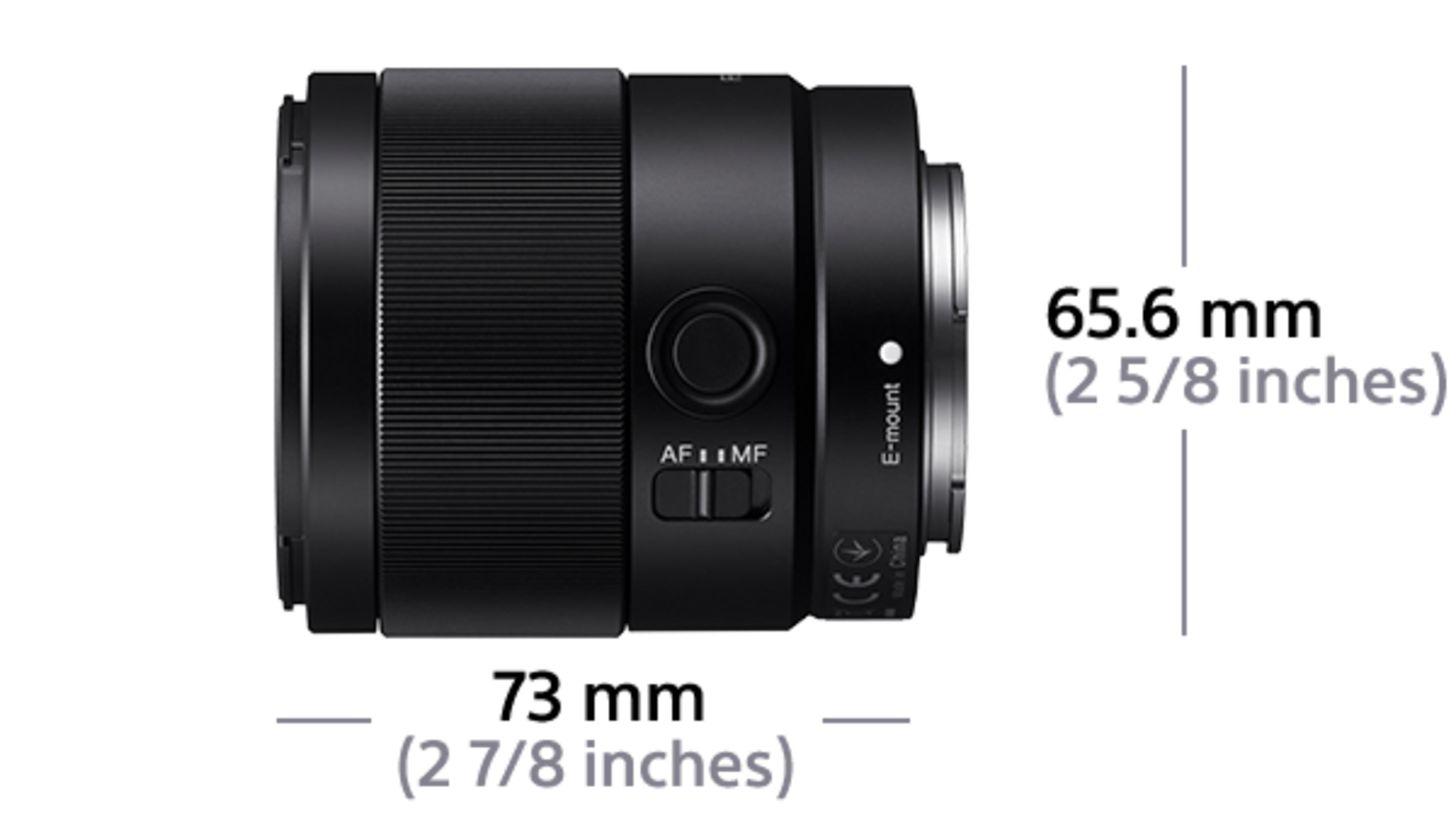 Black camera lens with AF/MF switch and E-mount. Dimensions: 73mm x 65.6mm.