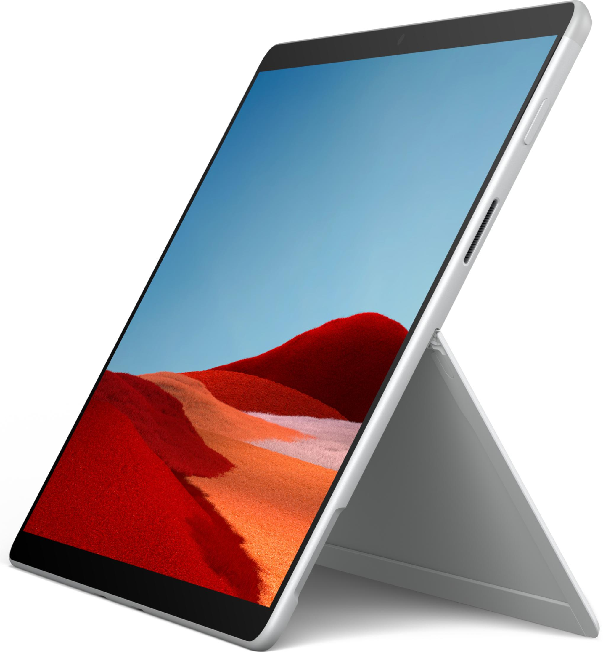 Ein silbernes Tablet mit Ständer zeigt eine Landschaft mit roten Hügeln und blauem Himmel.