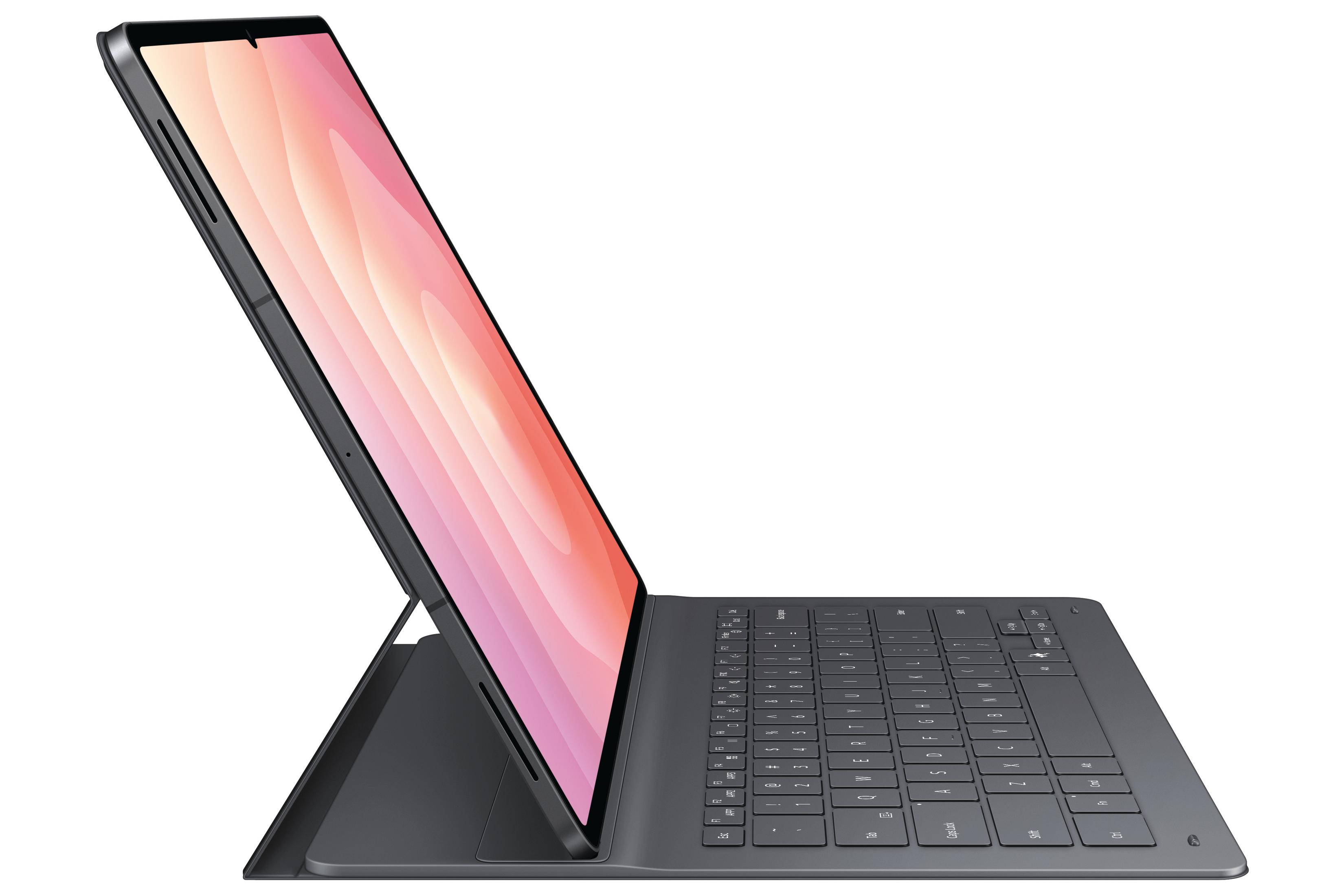 Ein dunkles Tablet mit Tastatur und einem rosafarbenen Hintergrund auf dem Bildschirm.