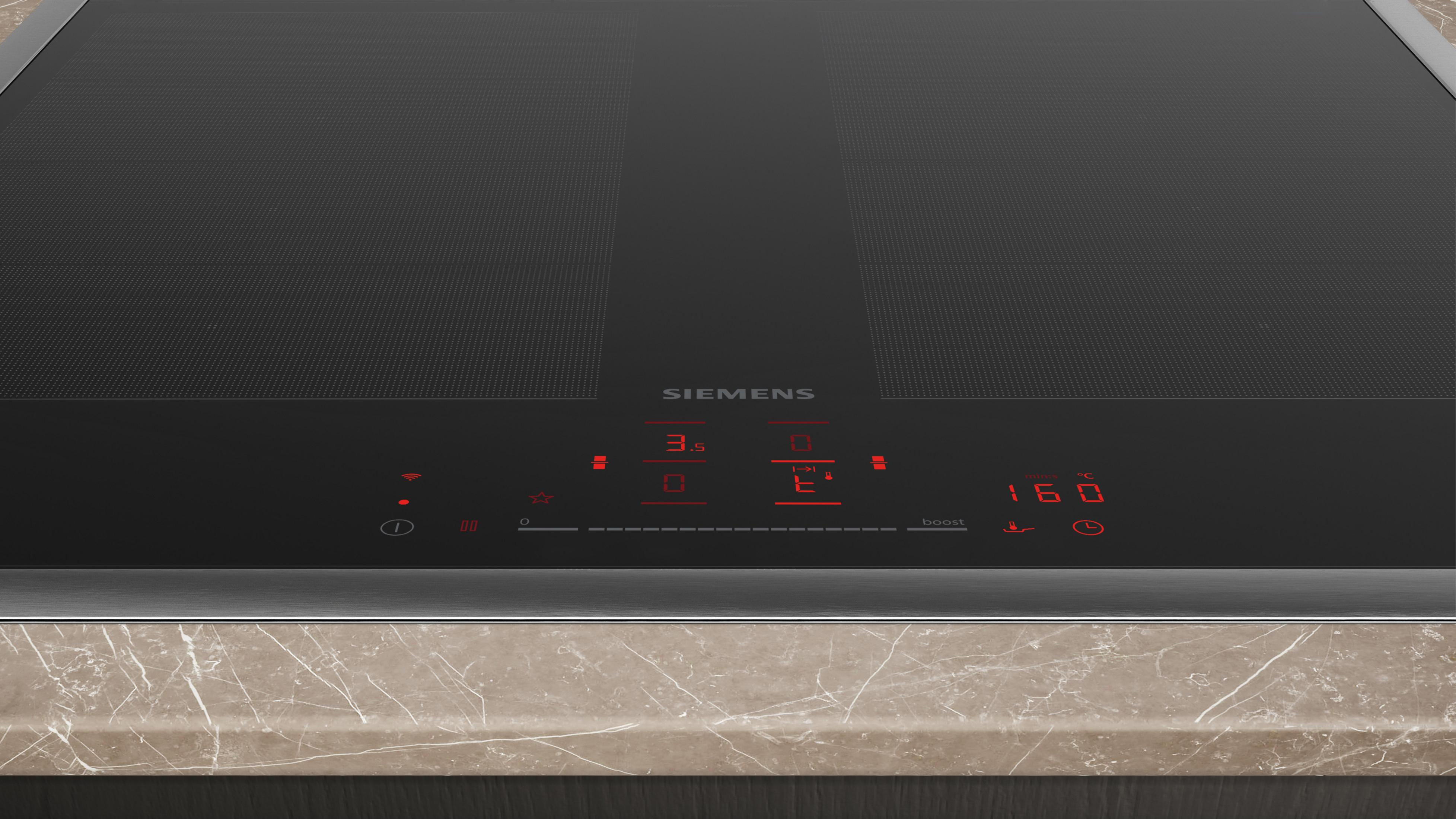 Płyta indukcyjna Siemens z cyfrowym wyświetlaczem i panelem dotykowym.