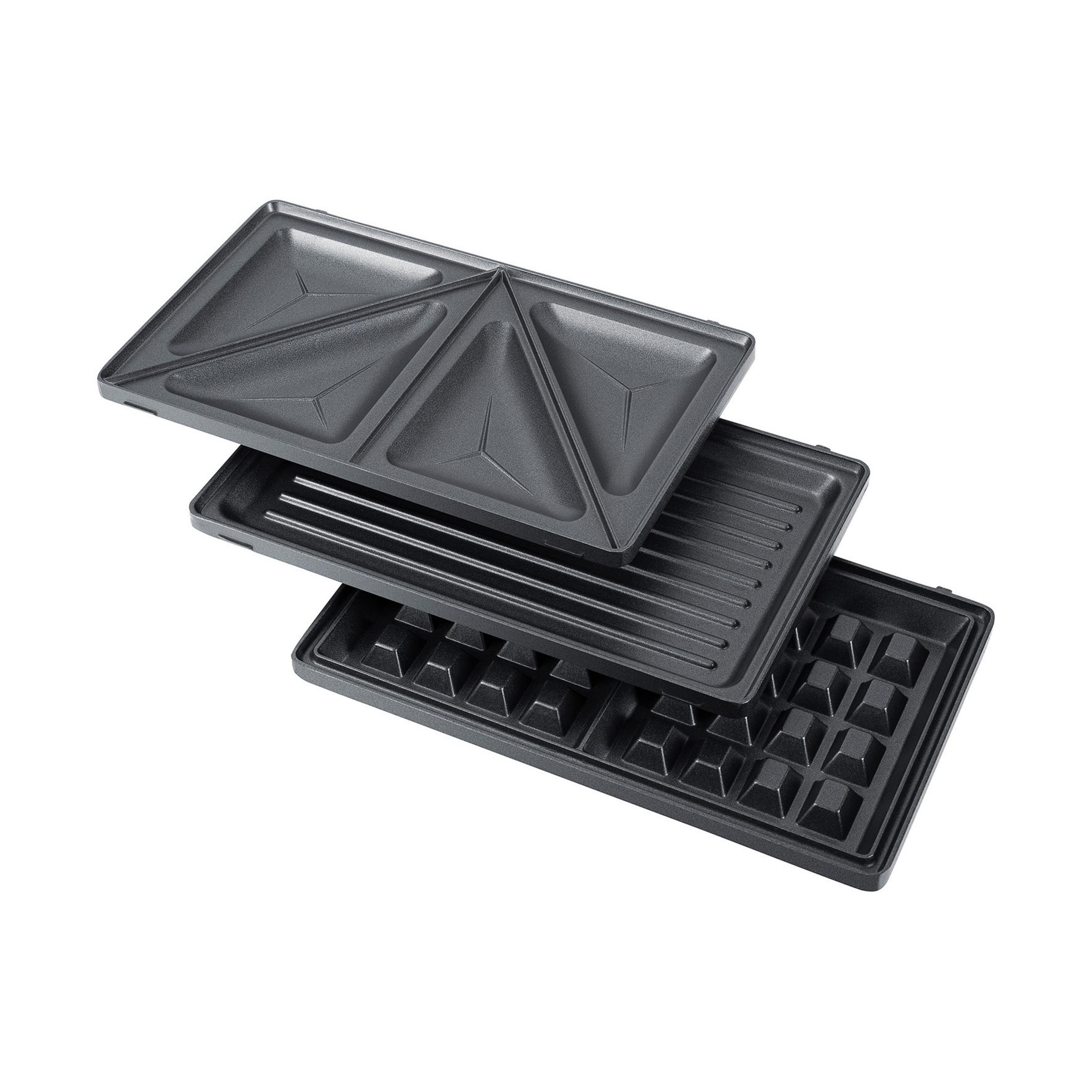 Drei austauschbare Platten für ein Sandwichmaker: Dreieck, Grill und Waffel.