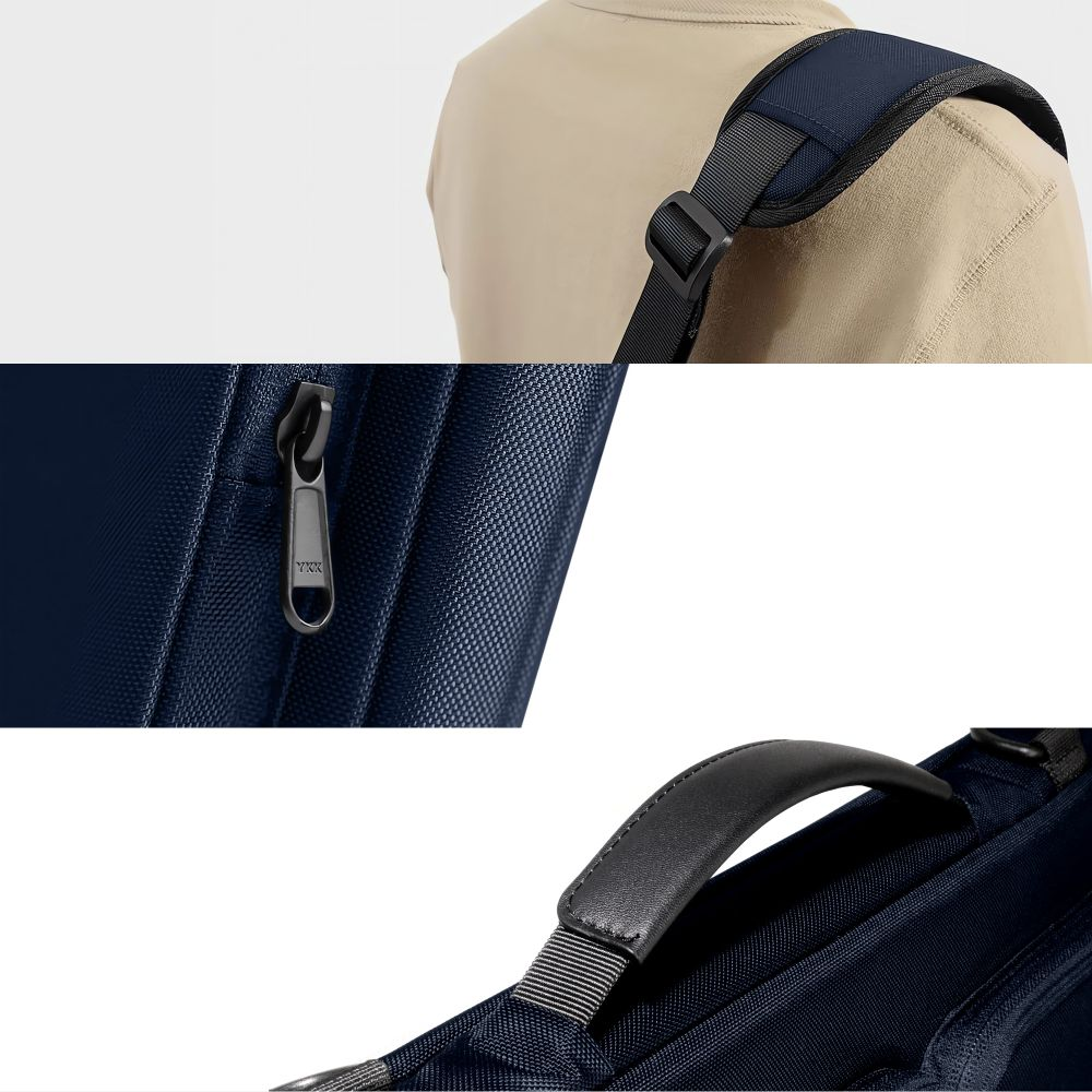 Nahaufnahme einer marineblauen Tasche: Schultergurt, YKK-Reißverschluss und gepolsterter Griff.