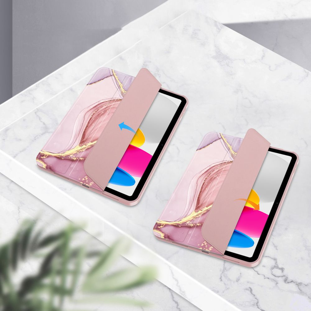Due custodie per tablet rosa con motivo marmorizzato su tavolo di marmo.