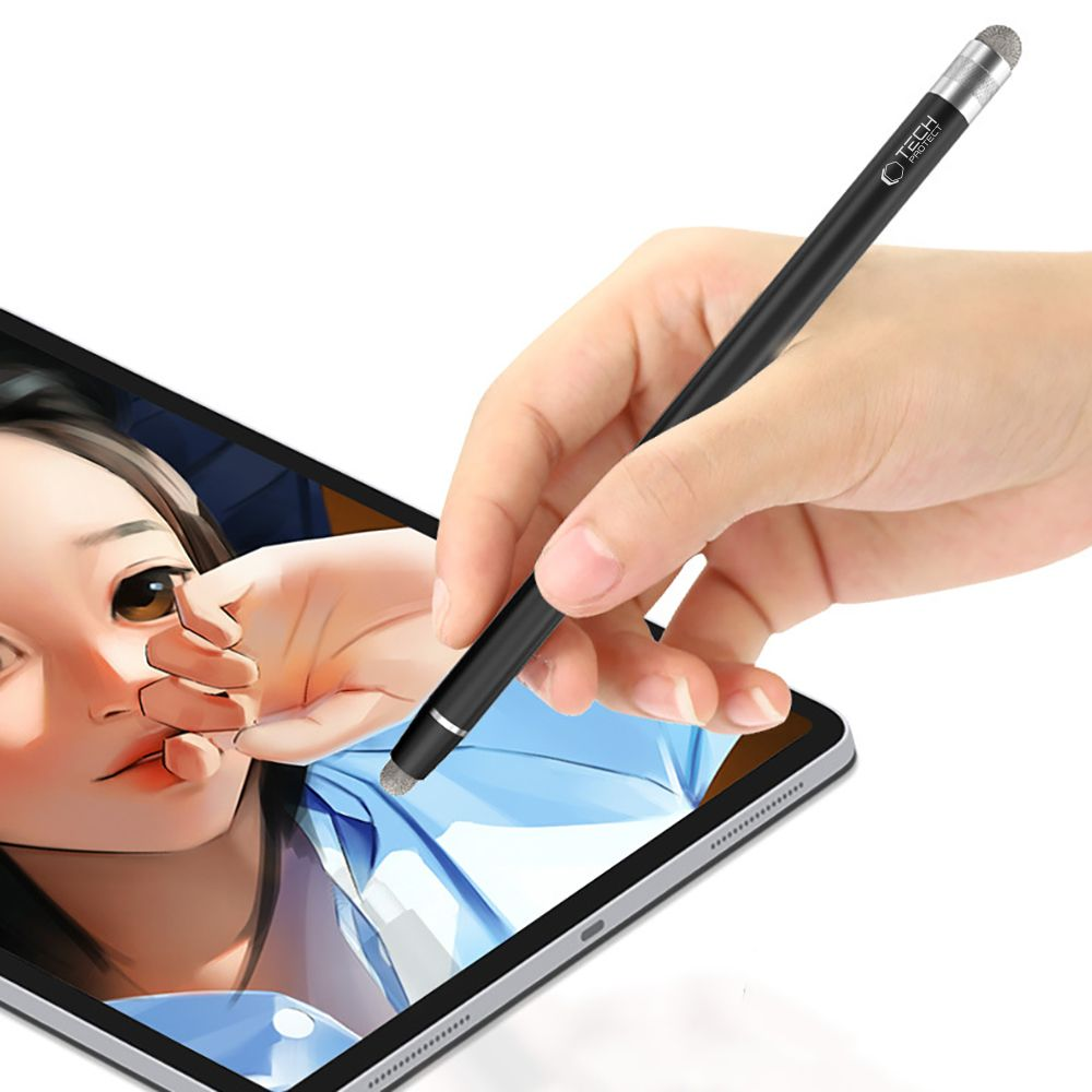 Eine Hand hält einen schwarzen Stift über ein Tablet, das ein Anime-Gesicht zeigt.
