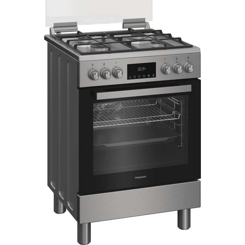 Una cucina a gas Hotpoint argentata con sportello del forno nero e display digitale che mostra '00:34'.