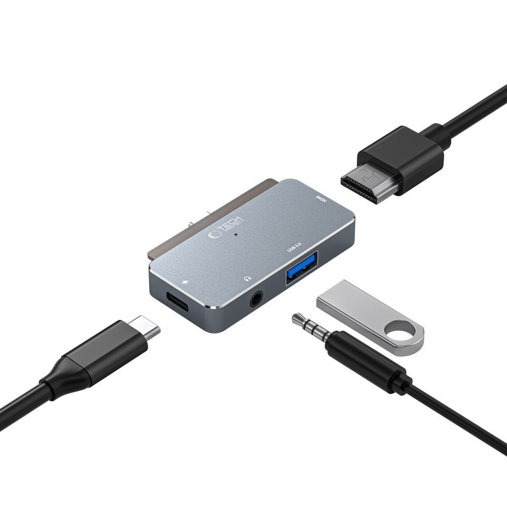 Un hub USB-C argento con porte HDMI, USB-A e audio.