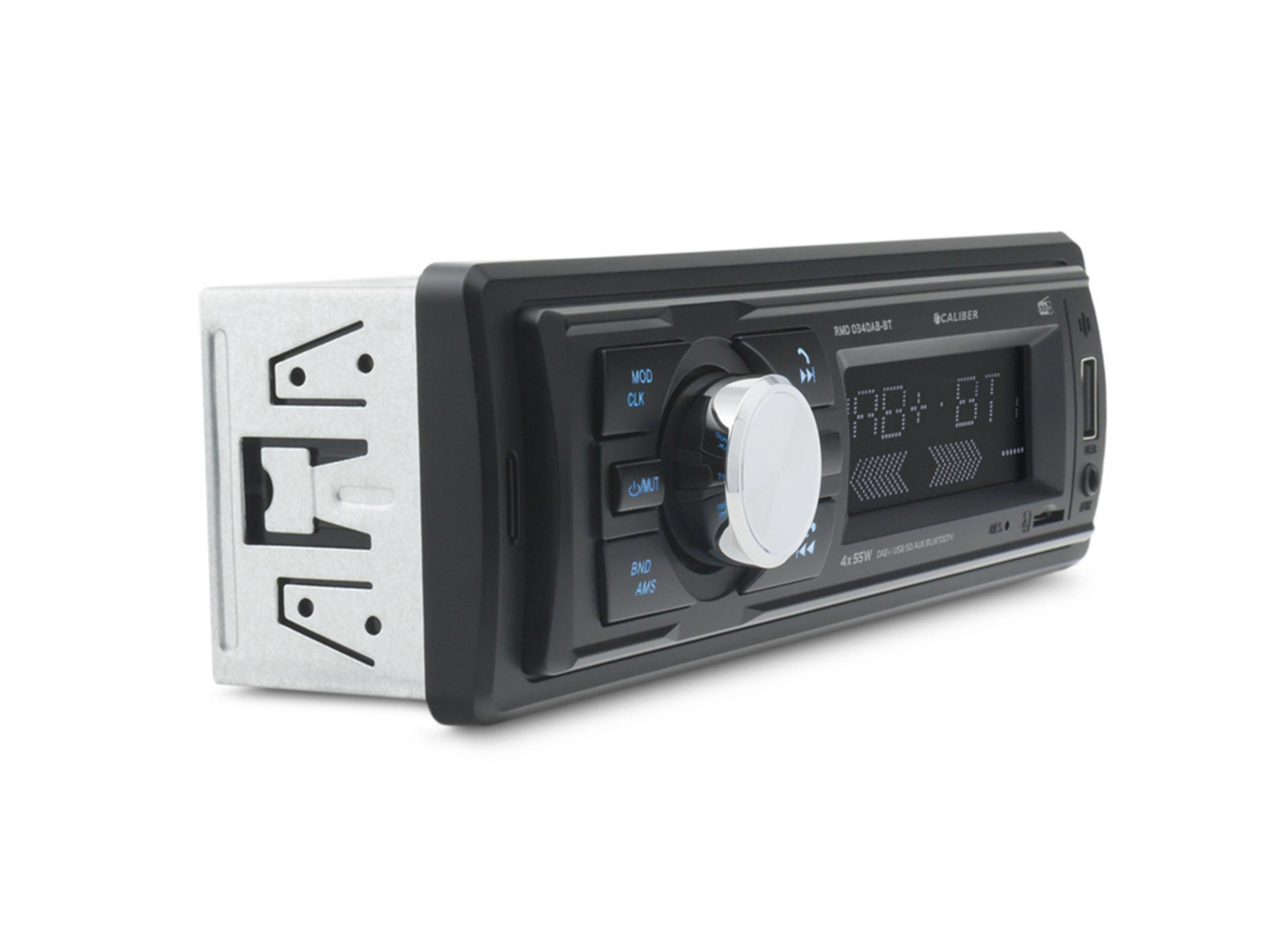 A black car stereo with a silver knob and display. The housing is isolated.