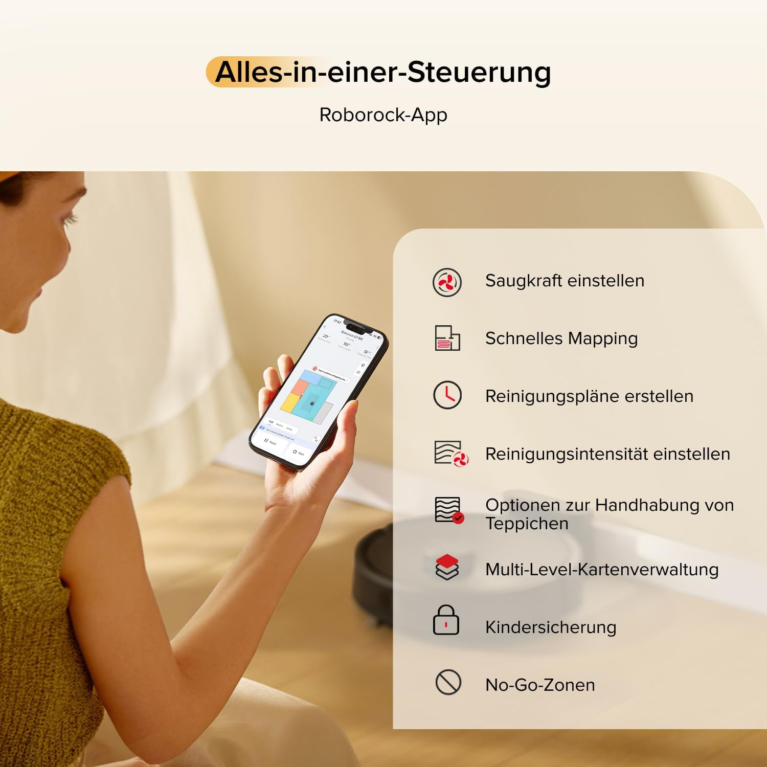 Persona sostiene smartphone con app robot aspirador. Se listan funciones.