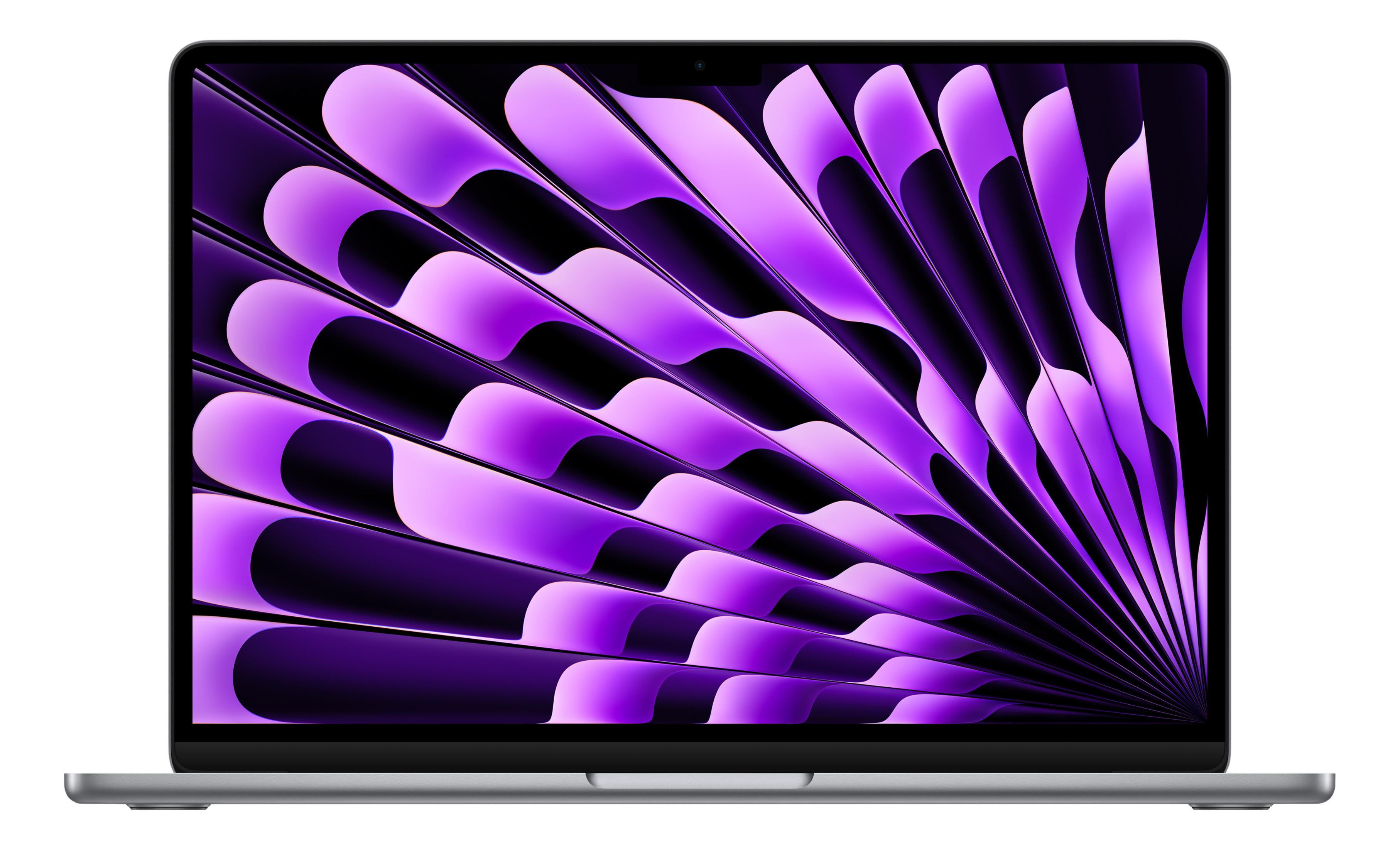 Un laptop argentato mostra uno sfondo viola a forma di ventaglio.