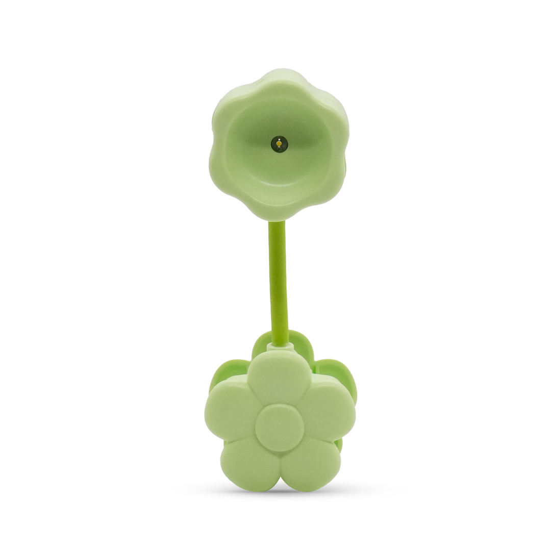 Una lampada verde a forma di fiore su sfondo bianco.