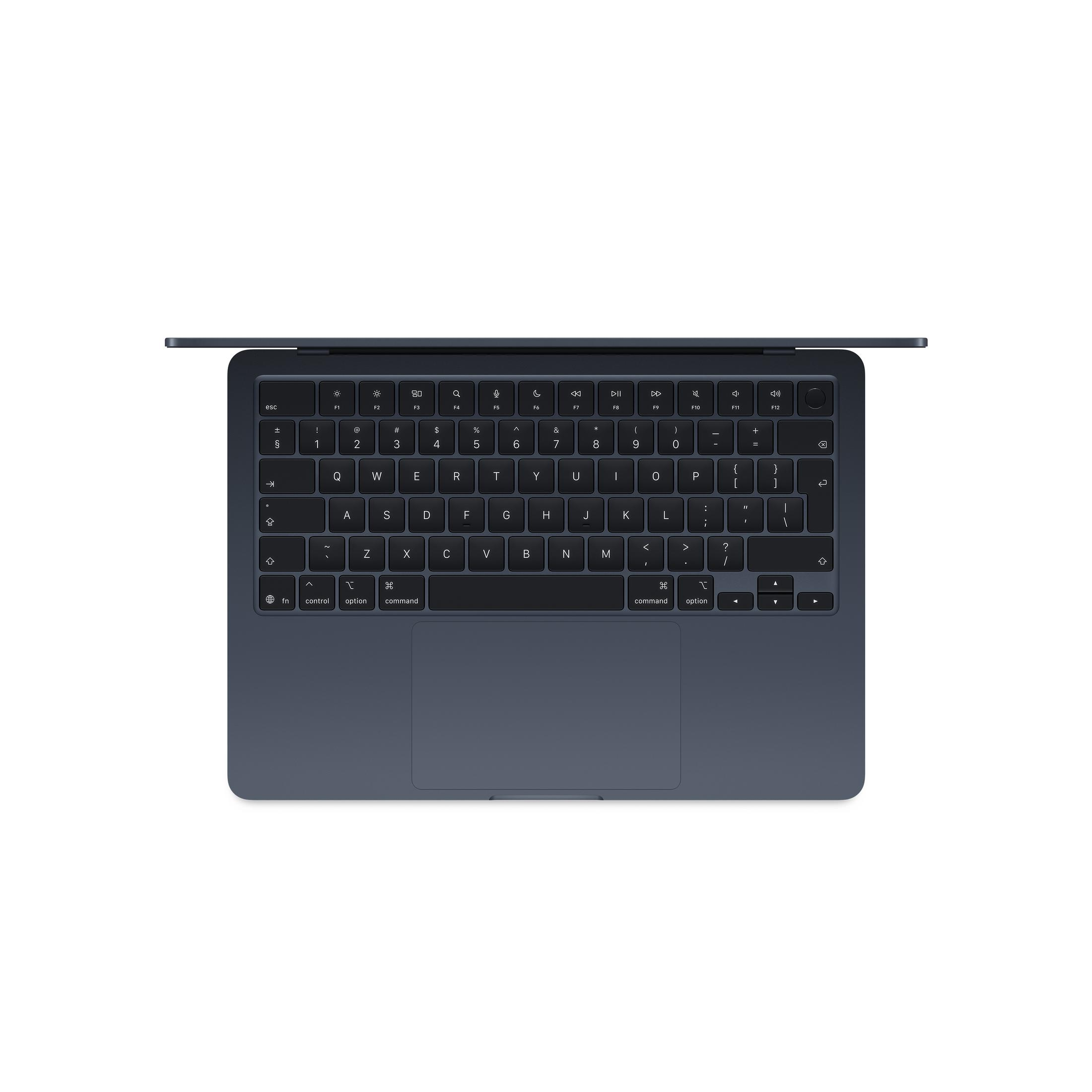 Eine dunklebläuliche Tastatur eines Laptops mit einem Touchpad.