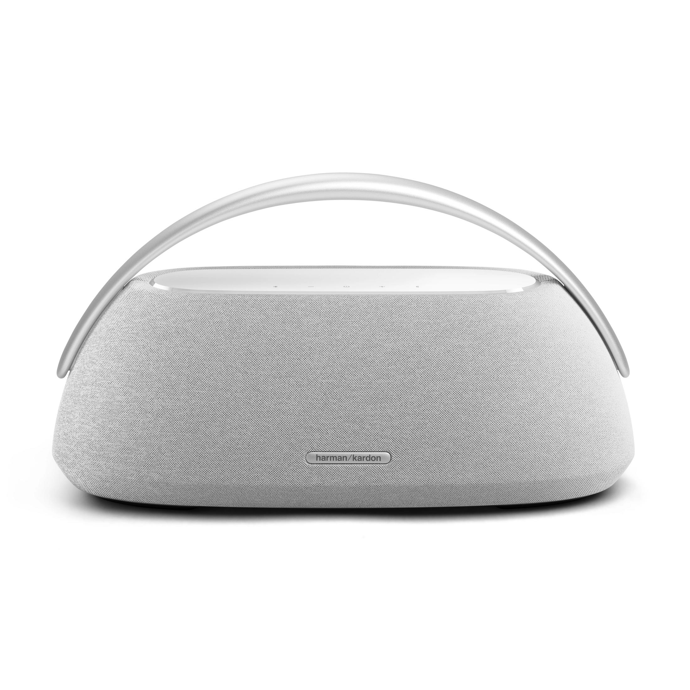 Szary głośnik Harman Kardon ze srebrnym uchwytem.