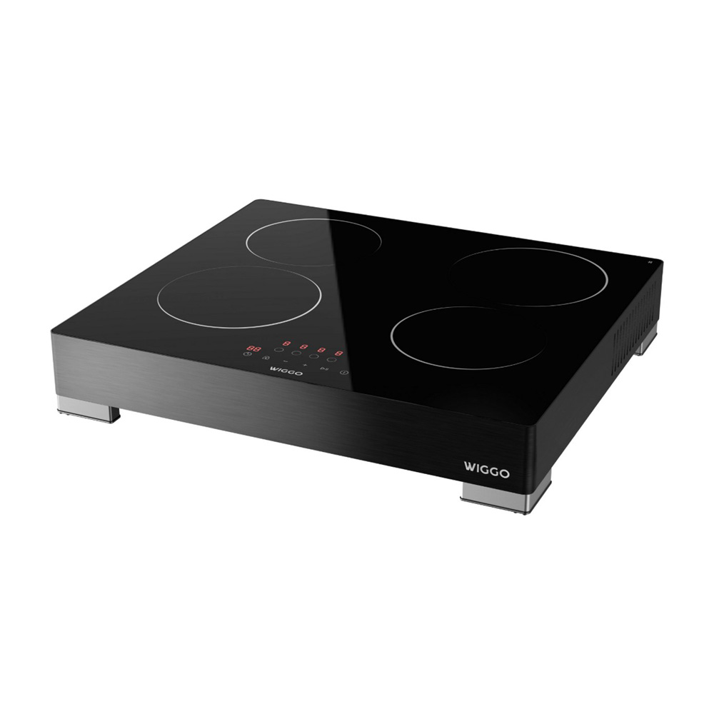 Black induction cooktop with four cooking zones and digital display.