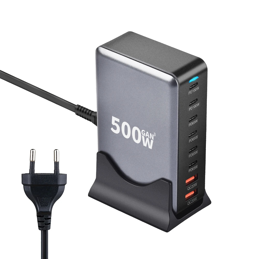 Grijze 500W GAN3 oplader met meerdere poorten en zwarte stekker.