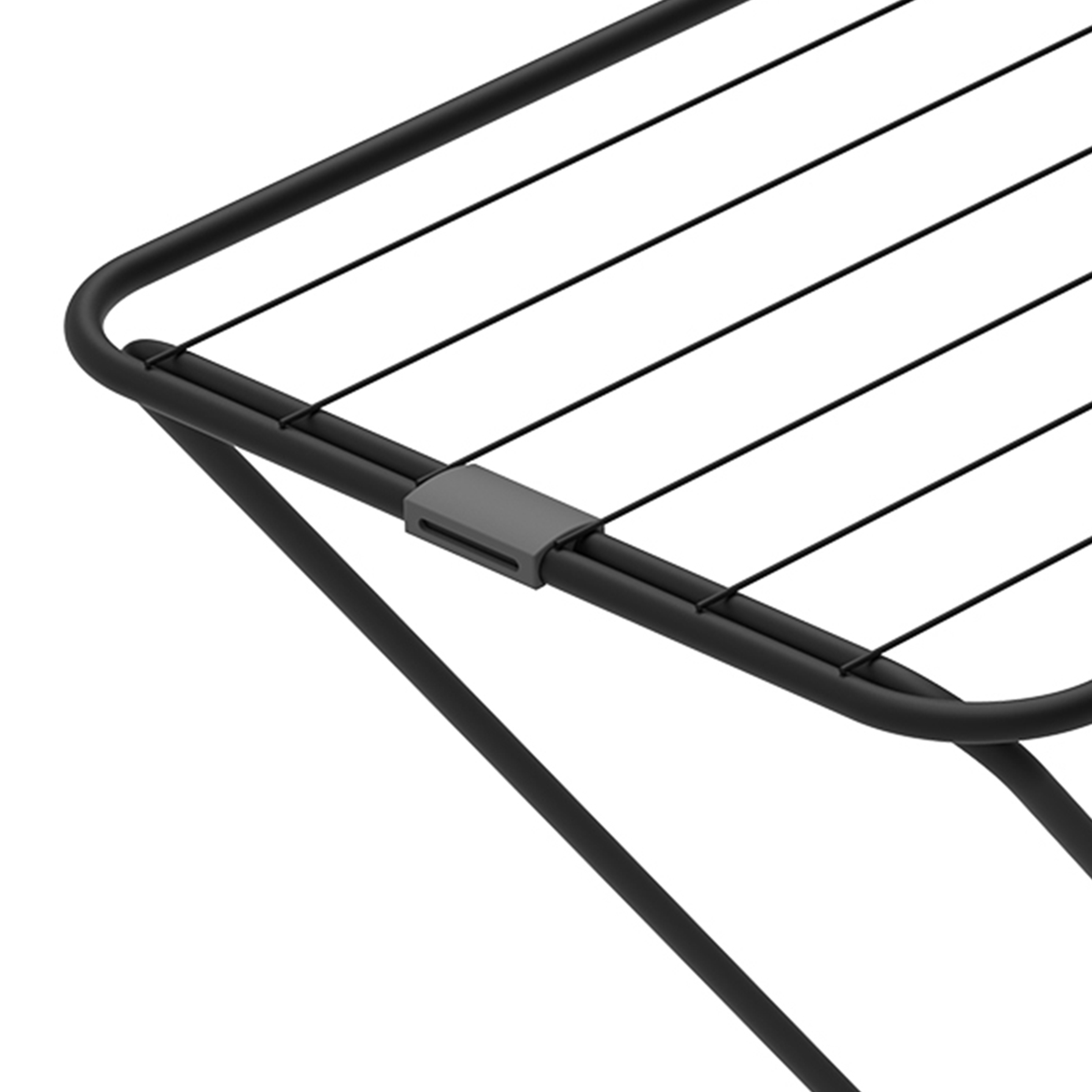 A black clothes drying rack with multiple thin lines in a close-up detail.