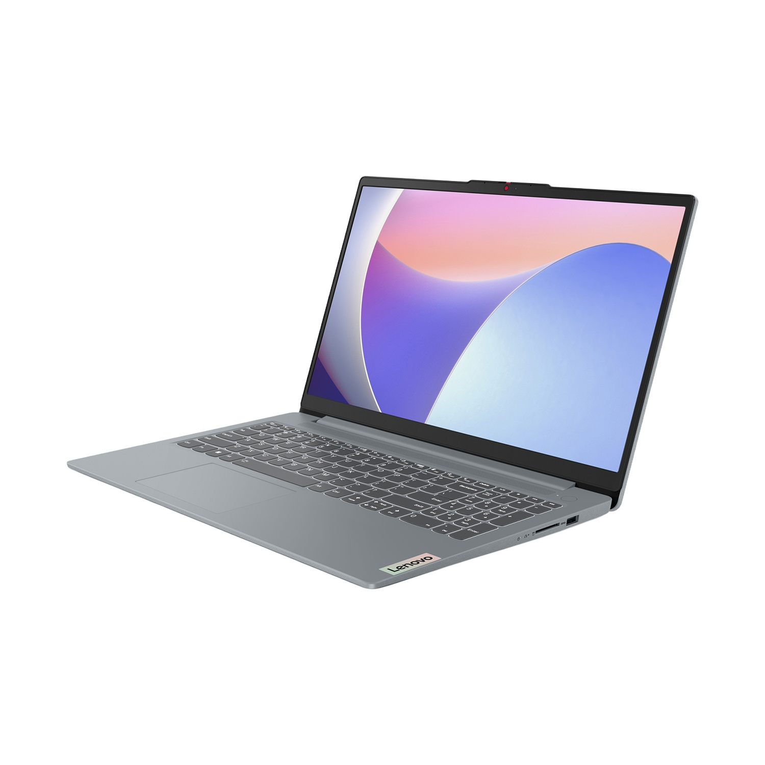 Un laptop grigio chiuso con uno sfondo colorato sullo schermo.