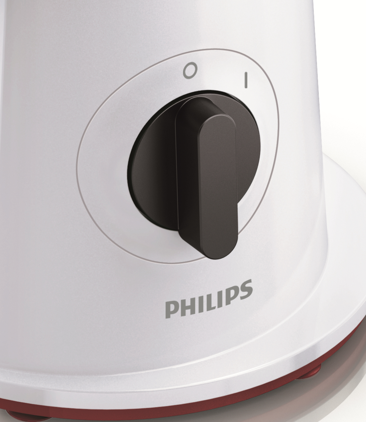 Close-up of a white Philips blender with a black on/off dial.