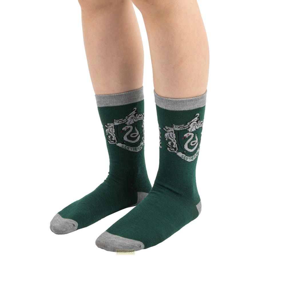 Calcetines verdes con emblema de Slytherin y puño y talón grises.