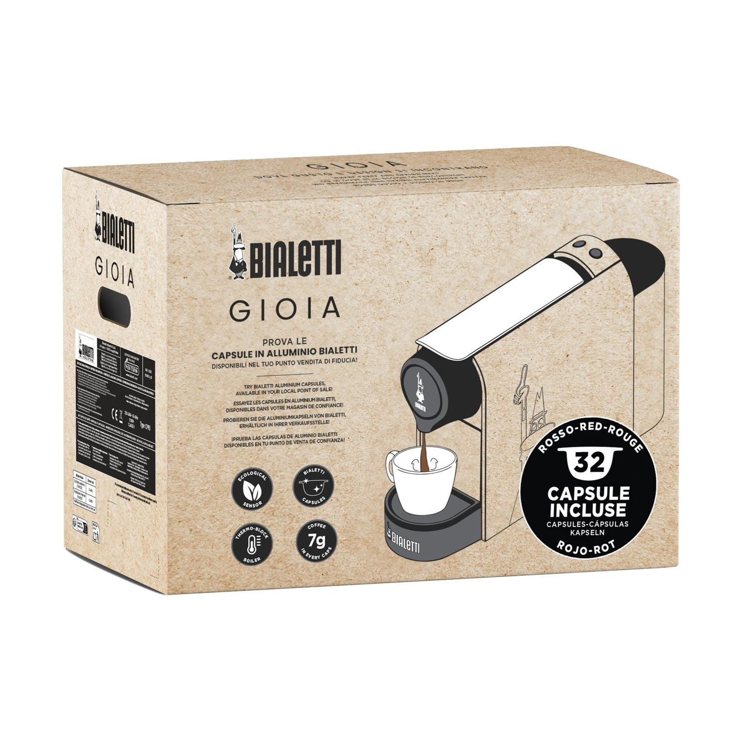 Macchina da caffè Bialetti su scatola di cartone con capsule, tazza e latte.