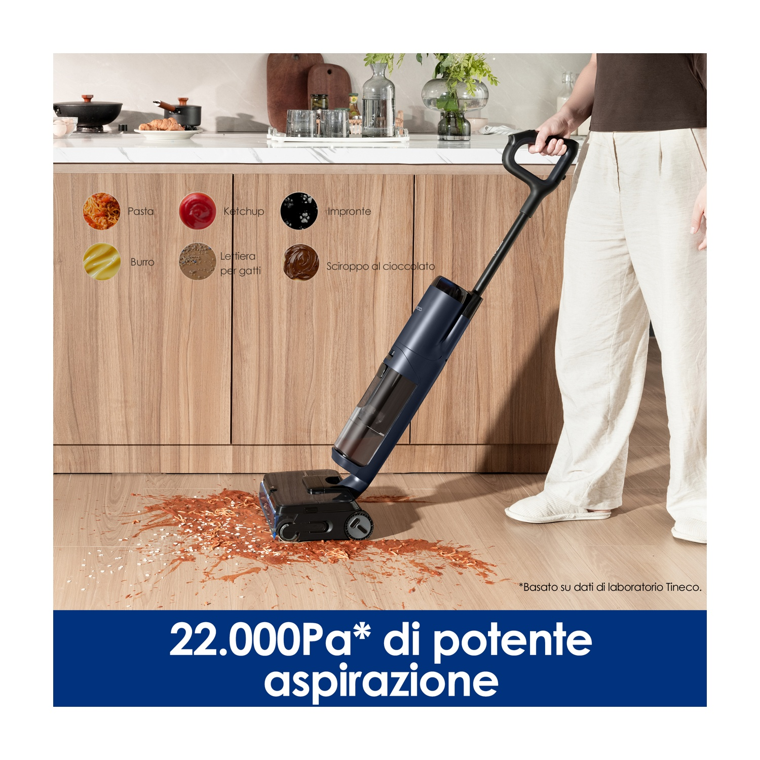 Bodenreiniger saugt verschüttete Nudeln auf. Sechs Kreise zeigen Pasta, Ketchup, Abdrücke, Butter, Katzenstreu, Schokolade.