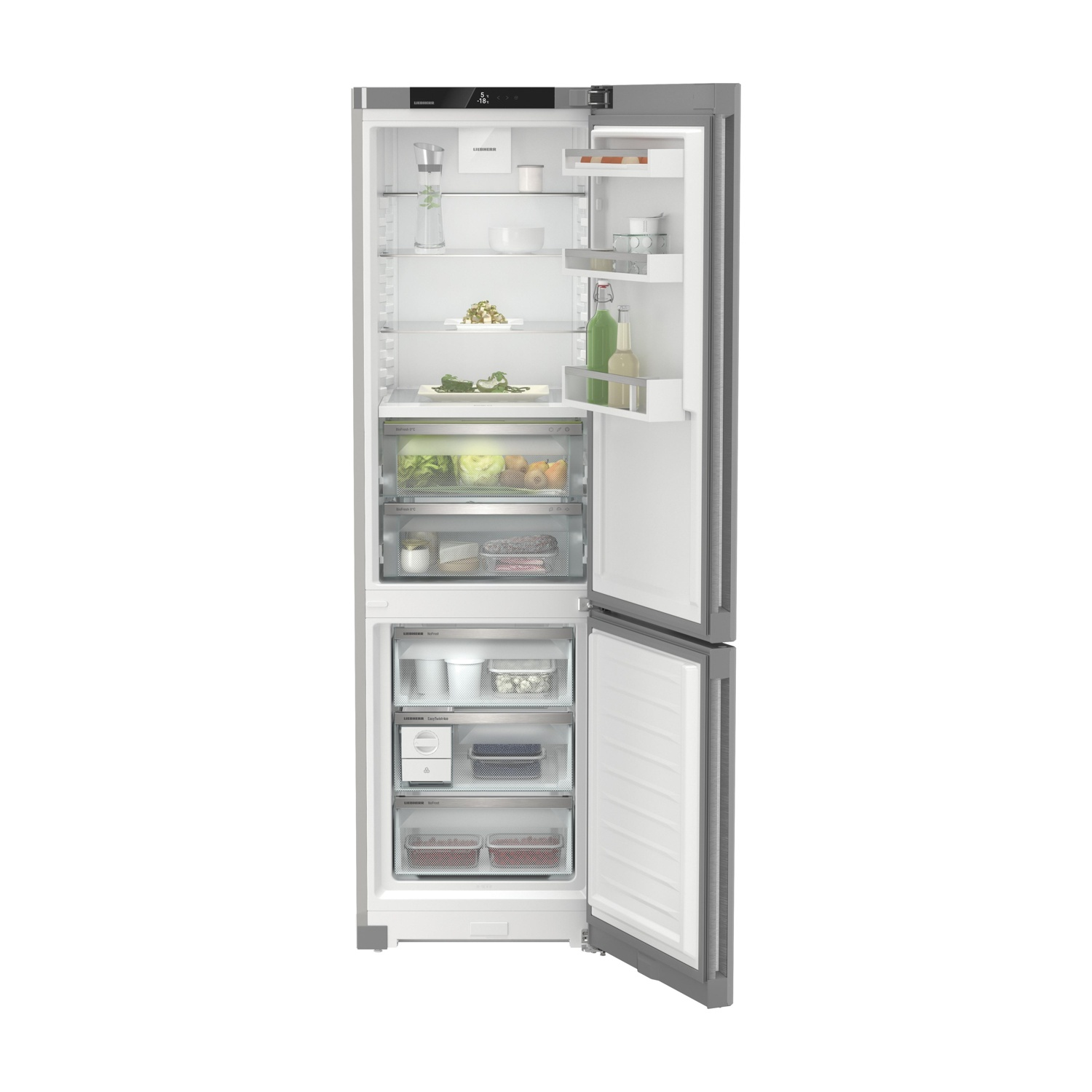 Ein offener Kühlschrank mit Lebensmitteln und Schubladen.