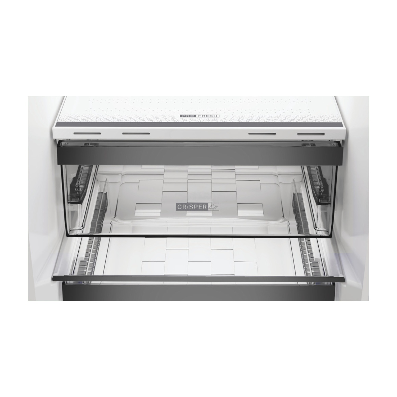 Widok wnętrza pustej komory lodówki z szufladą na warzywa.