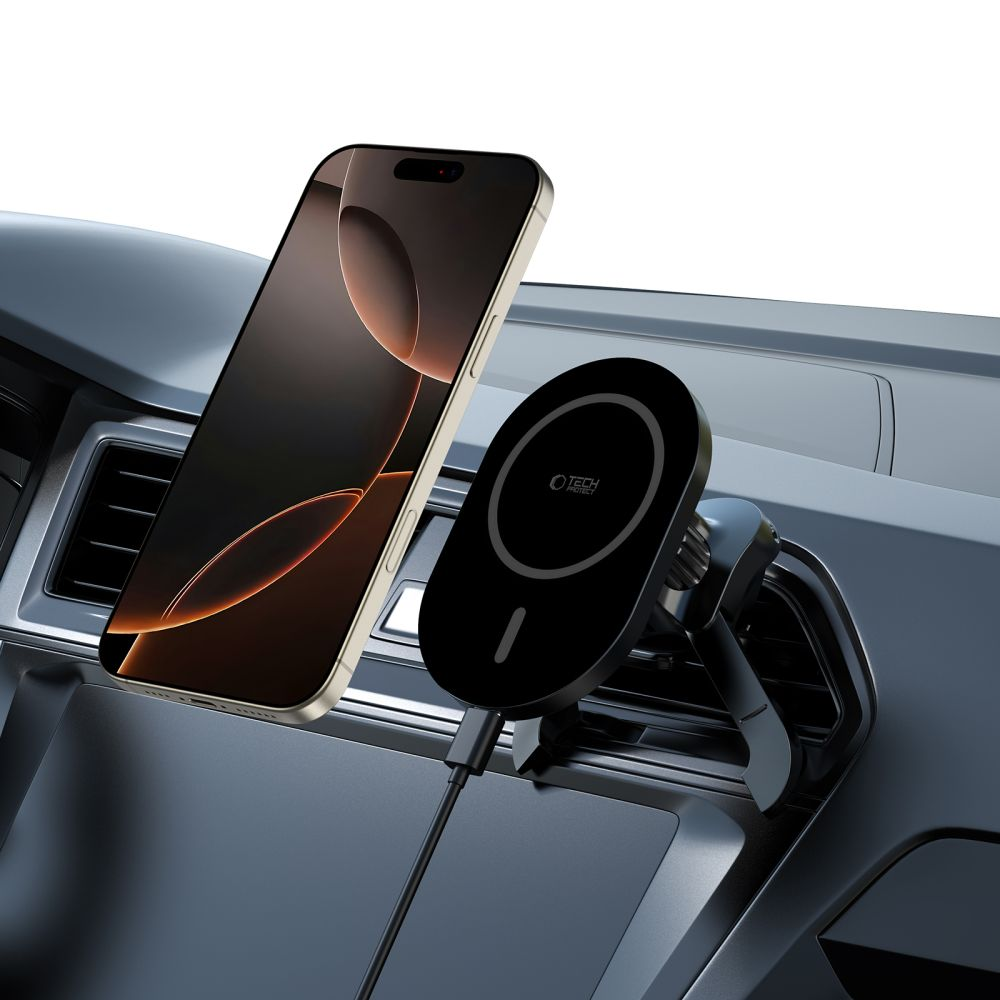 Ein schwarzer Handyhalter mit Kabel an einem Auto-Armaturenbrett, mit einem Handy.