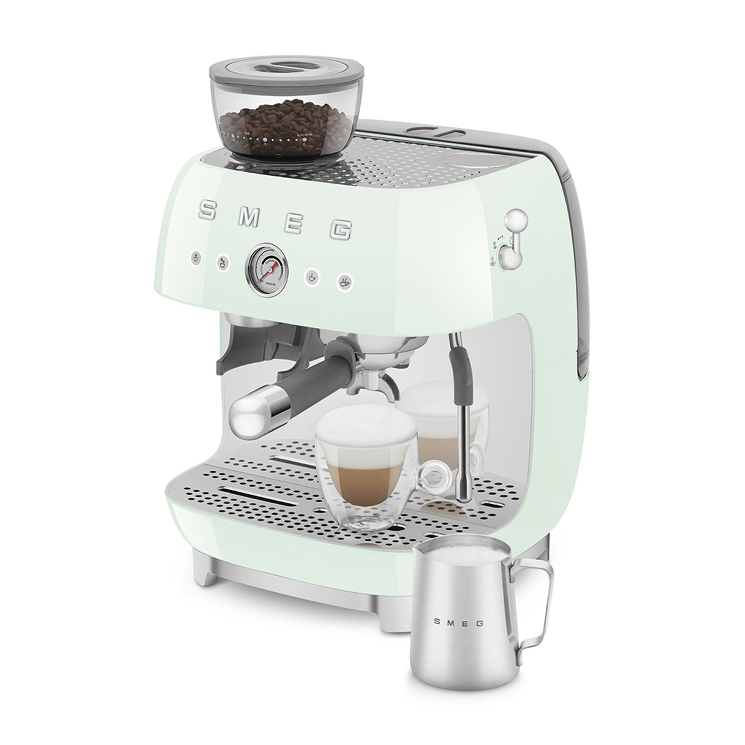 Miętowa zielona ekspres do kawy Smeg ze zbiornikiem na ziarna, dwoma szklankami i dzbankiem na mleko.