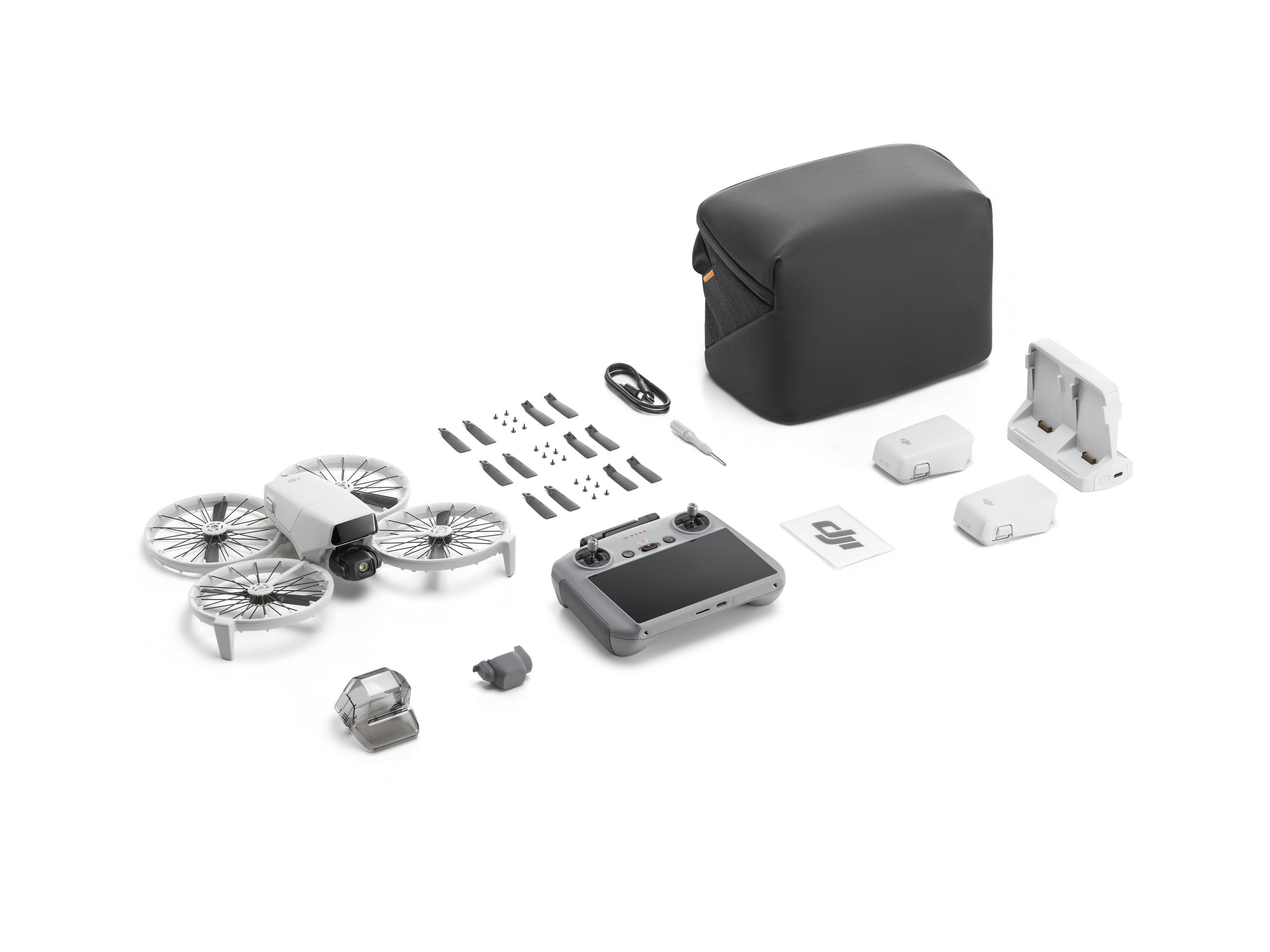 Drone con accessori: borsa grigia, controller, batterie, hub di ricarica, eliche, viti, cavo, strumento.