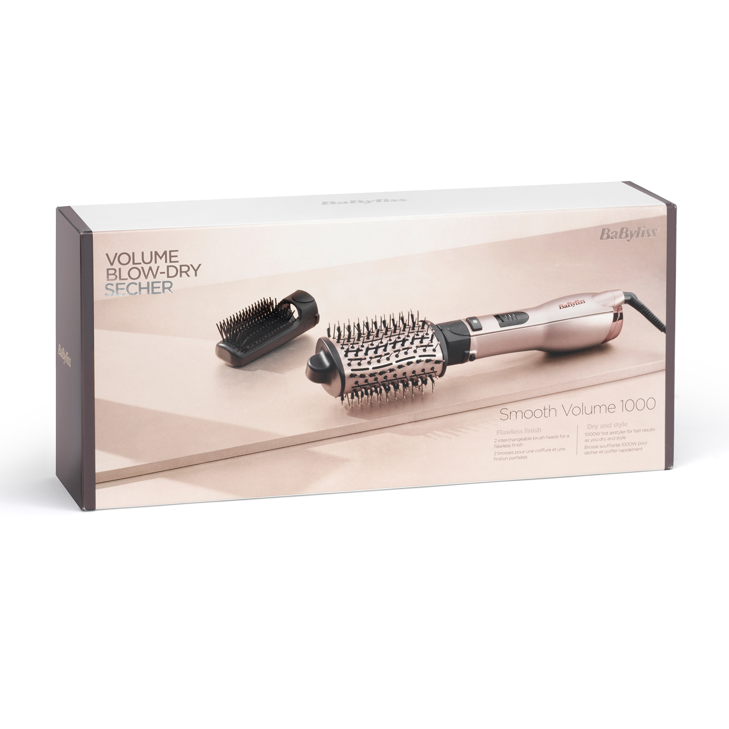 Emballage d'appareil coiffant or rose avec deux brosses.