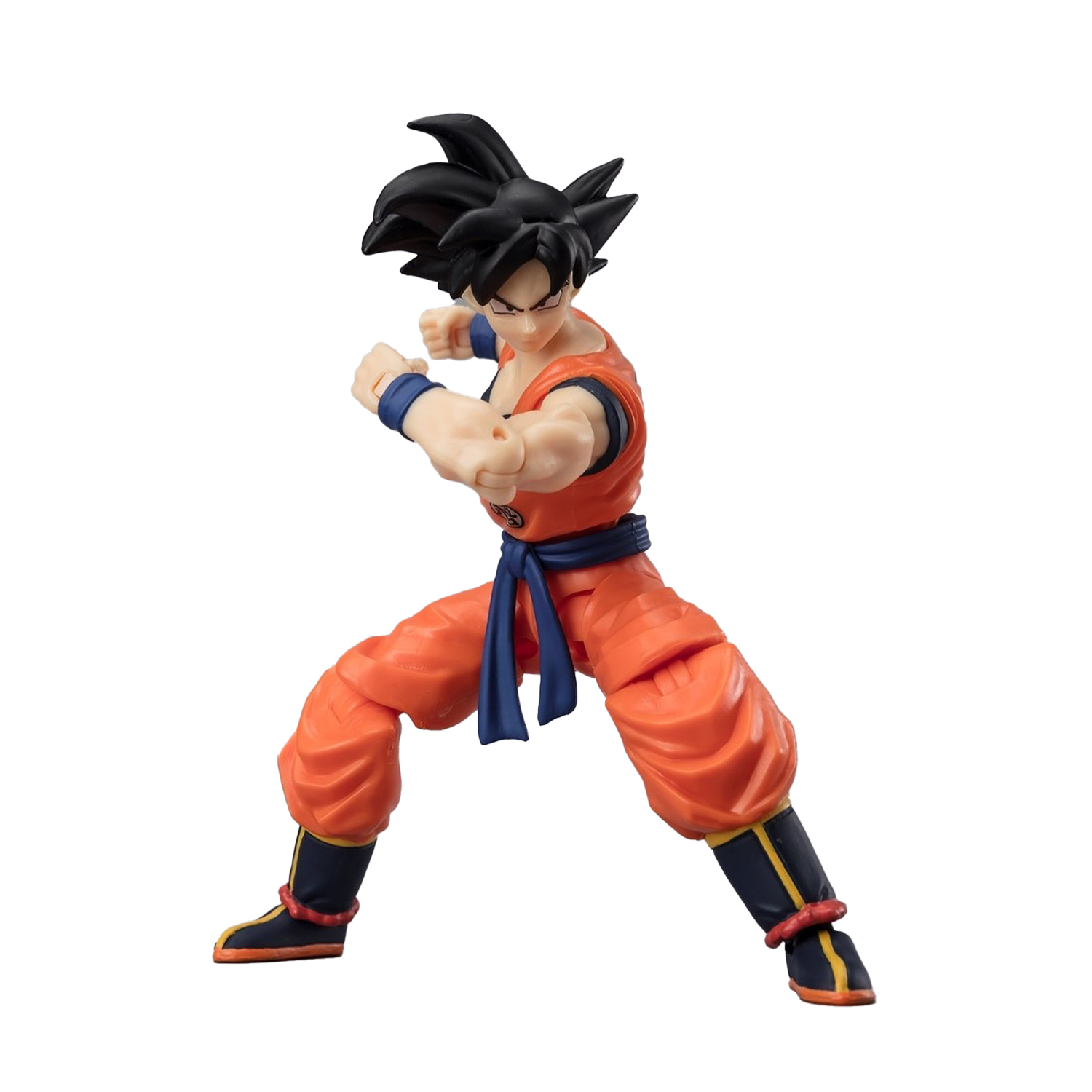 Action figure di Goku in abiti arancioni con fascia blu, in posa da battaglia.