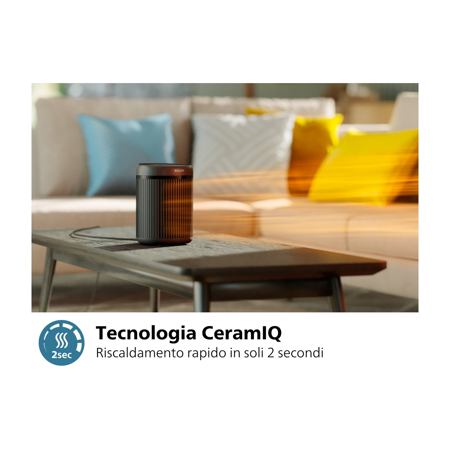 Czarna grzałka z pomarańczowymi elementami grzewczymi na drewnianym stole.