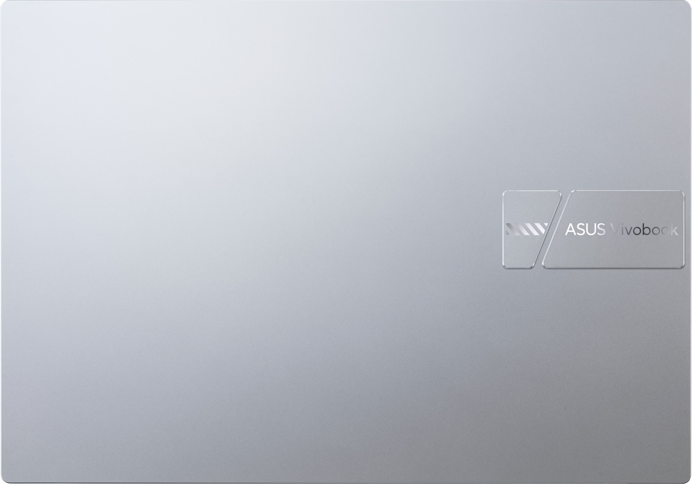 Portátil plateado con logo plateado de ASUS Vivobook.