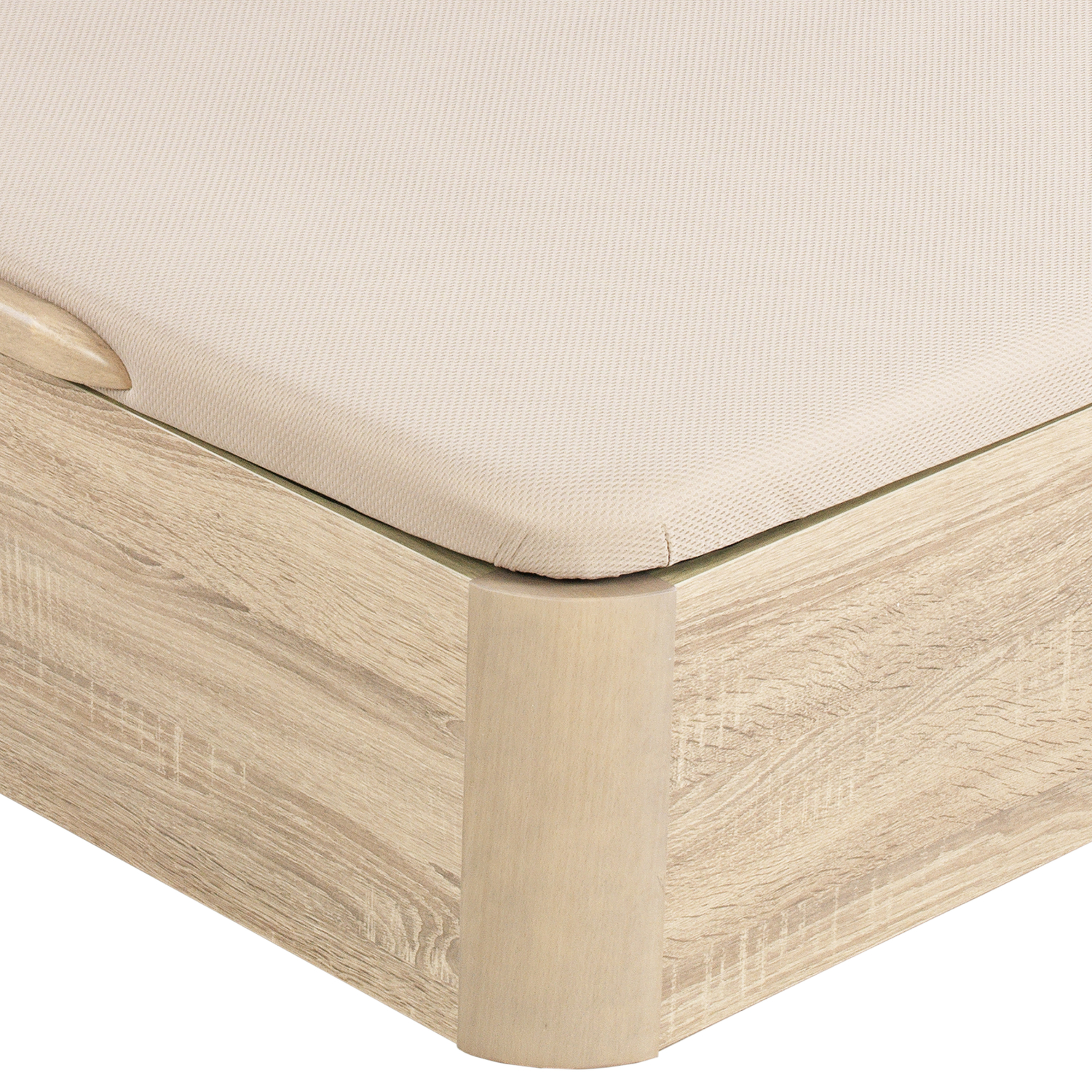 Primer plano de un colchón beige claro sobre base de madera con veta.