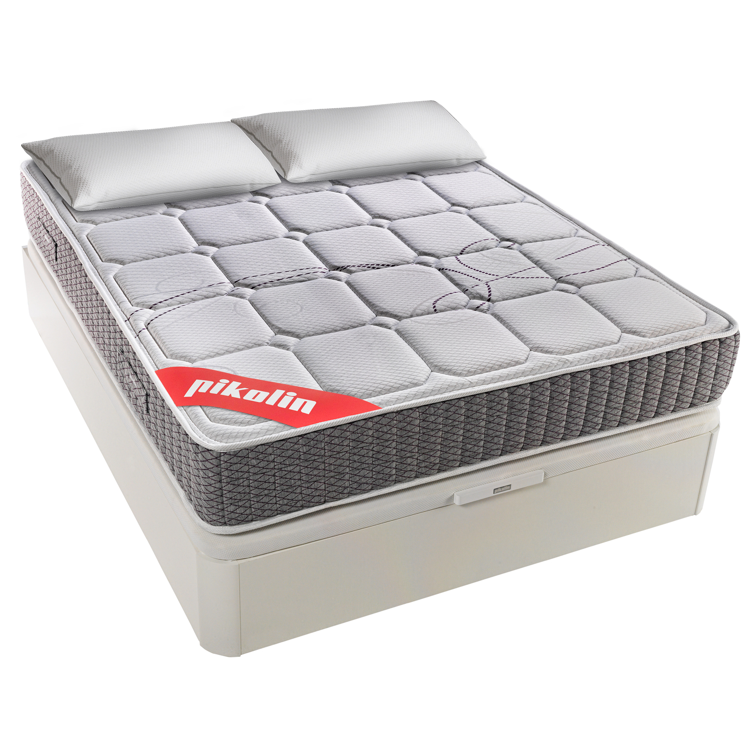 Un colchón gris y blanco con dos almohadas sobre una base blanca.