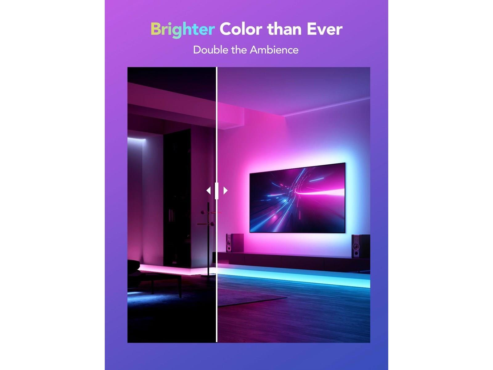 Nowoczesny salon z dużym telewizorem, oświetlony różowymi i niebieskimi światłami LED.