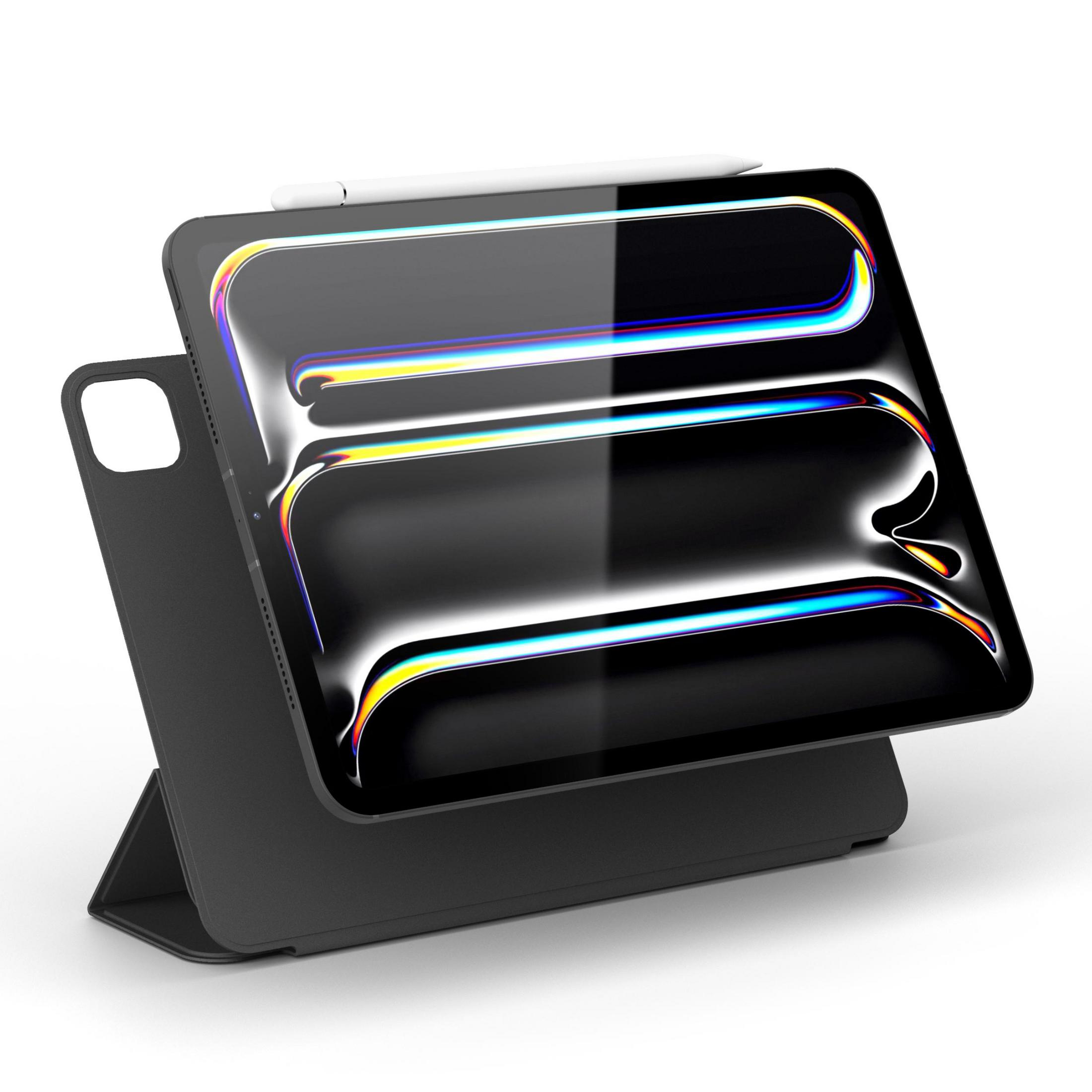Un tablet nero con stilo su un supporto, vista ravvicinata.