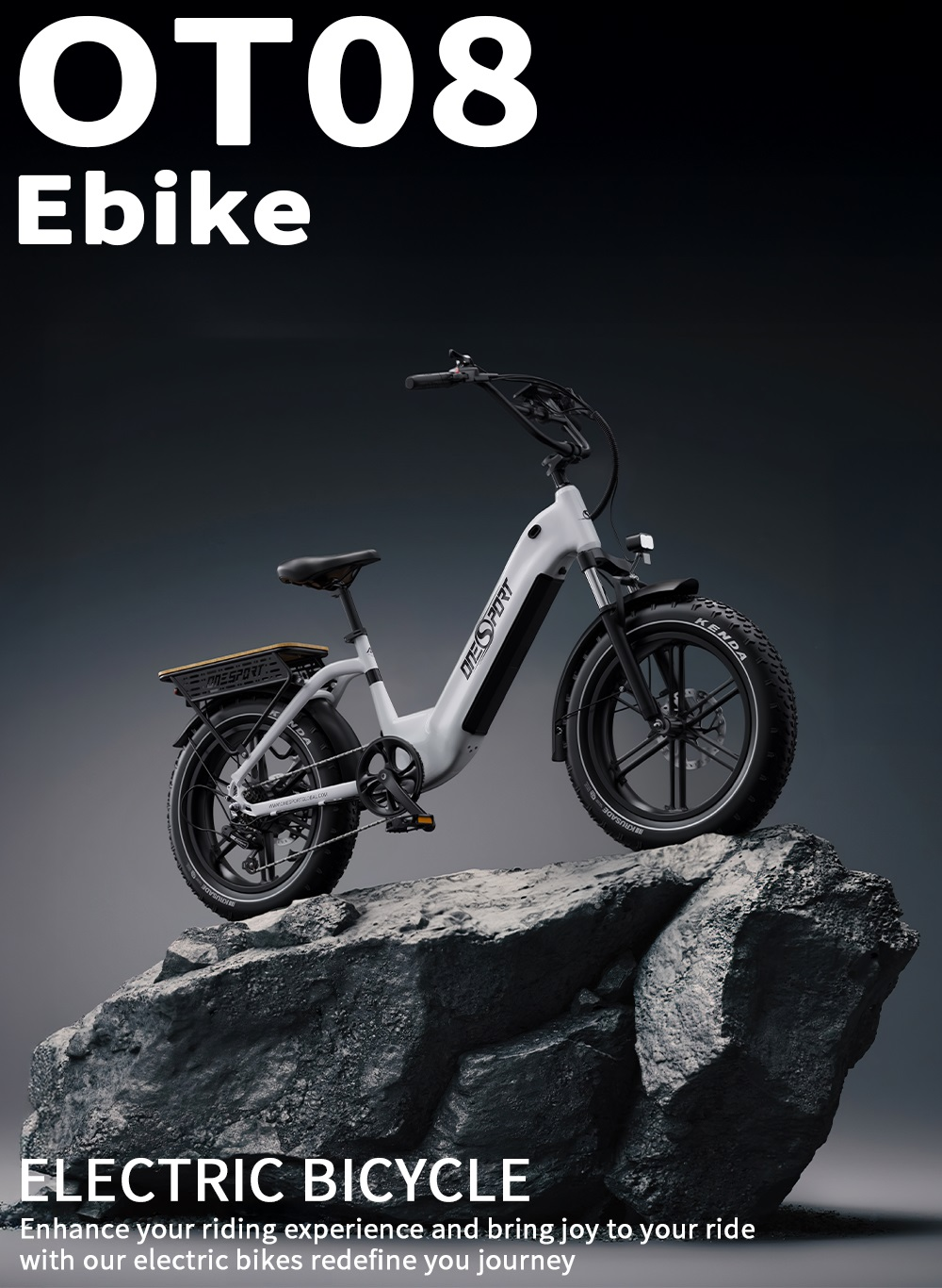 Una e-bike blanca con neumáticos anchos descansa sobre rocas.