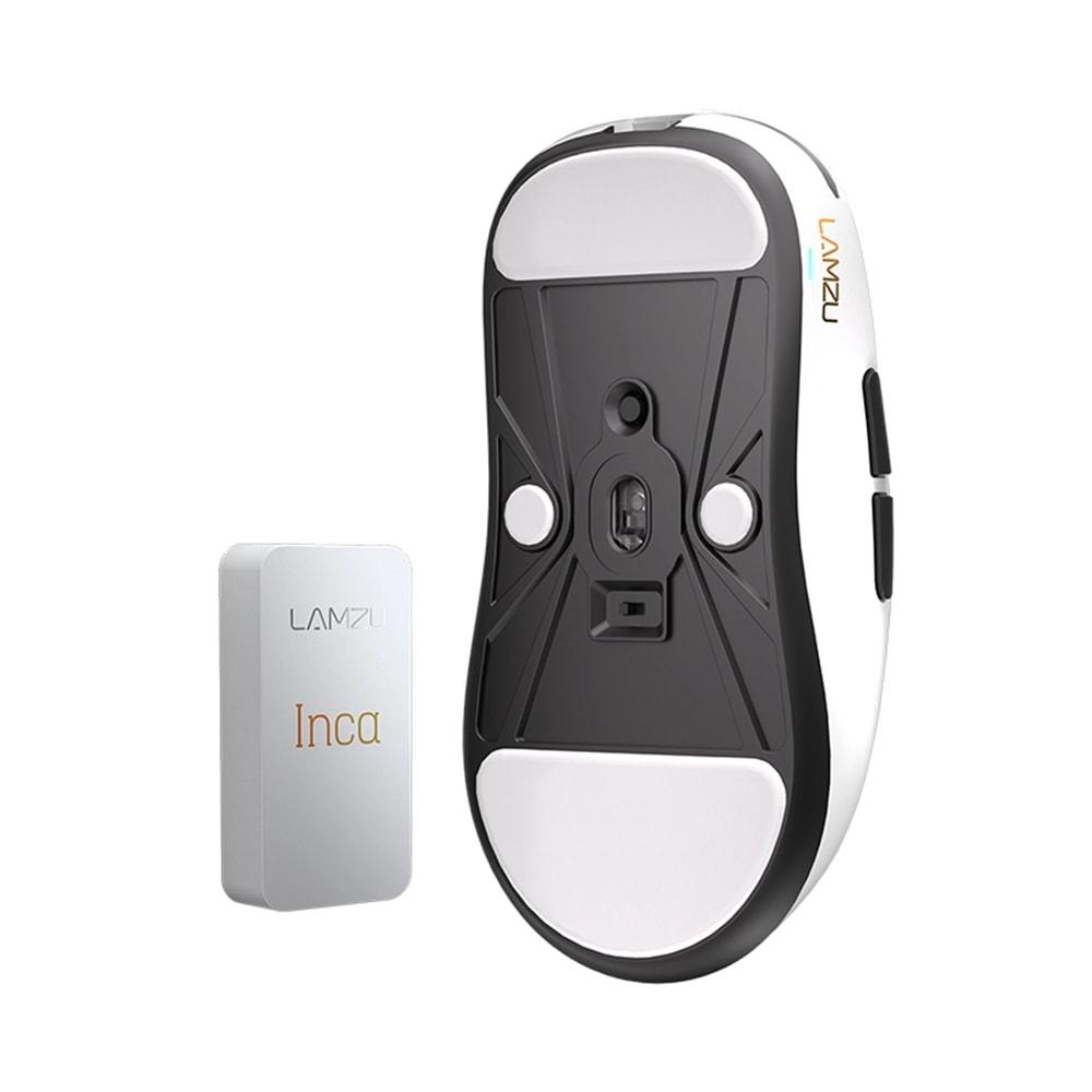 Siyah altlı beyaz fare, yanında 'Inca' yazılı beyaz dongle.