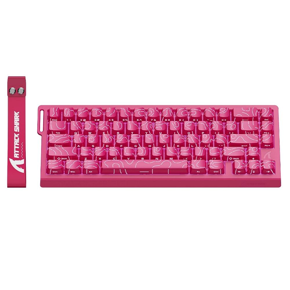 Beyaz desenli pembe klavye ve ATTACK SHARK logolu pembe şerit.