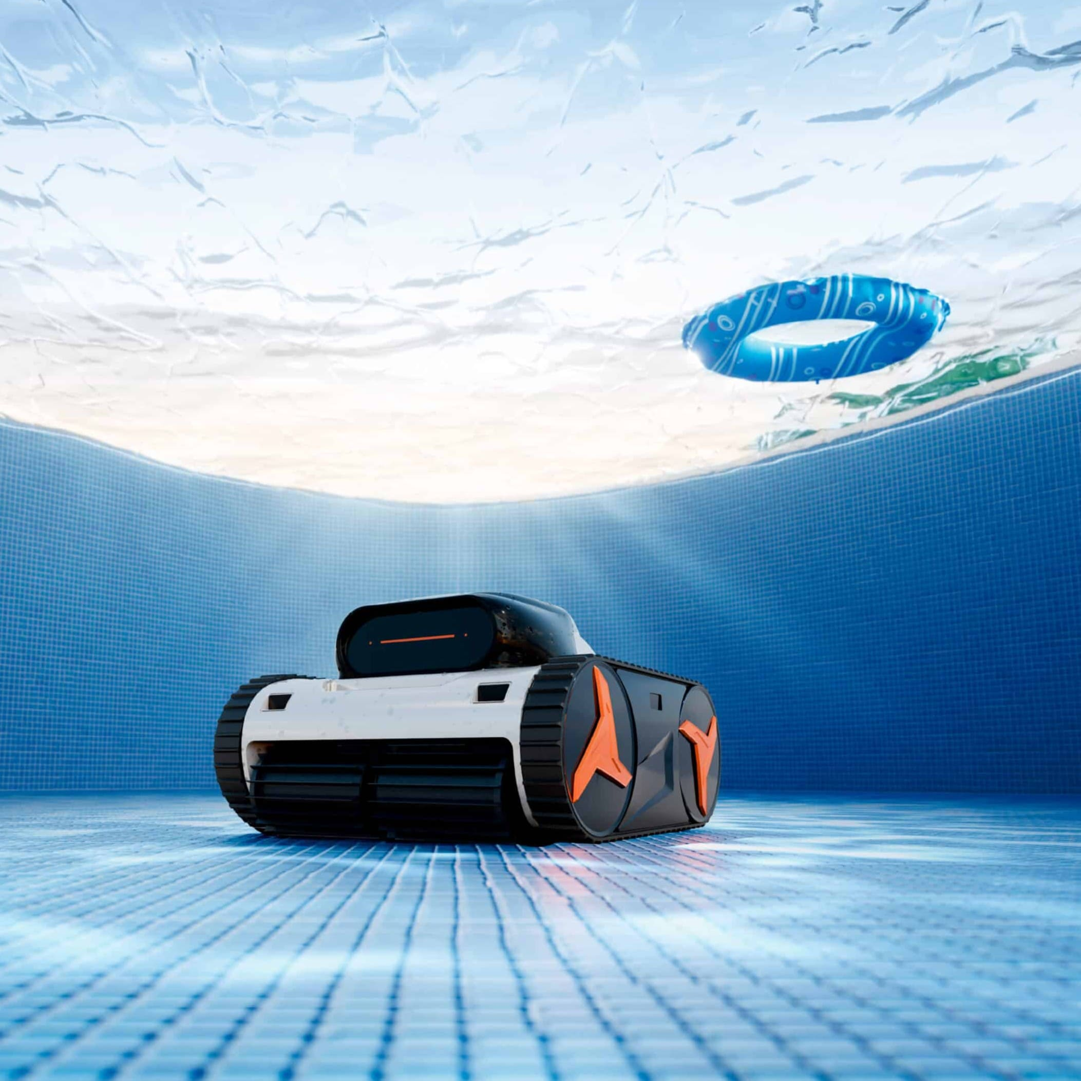 Un robot de piscina con orugas y detalles naranjas se mueve por el suelo alicatado.