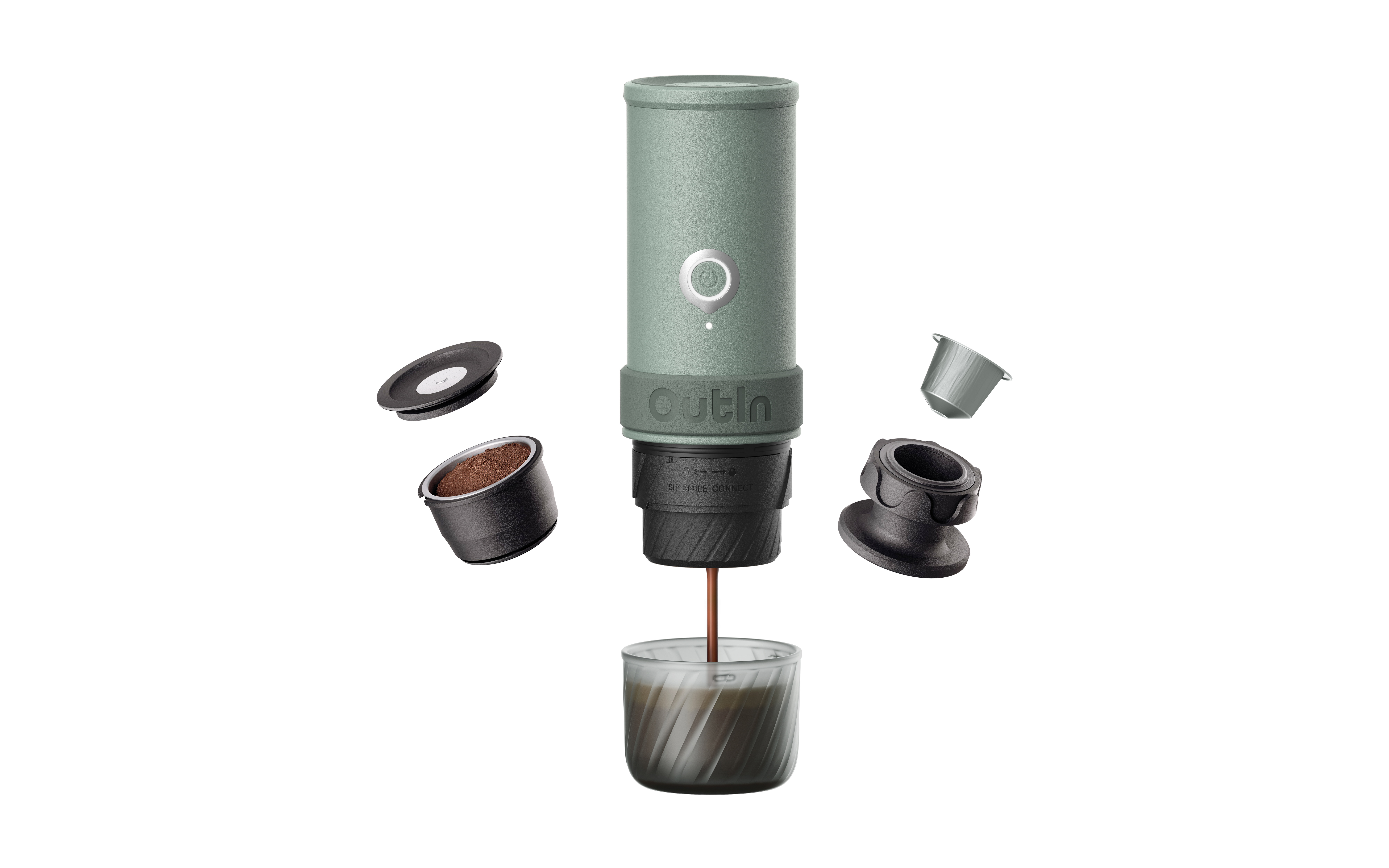 Grüne Kaffeemaschine mit Zubehör: Kapsel mit Kaffee, Deckel, Adapter.