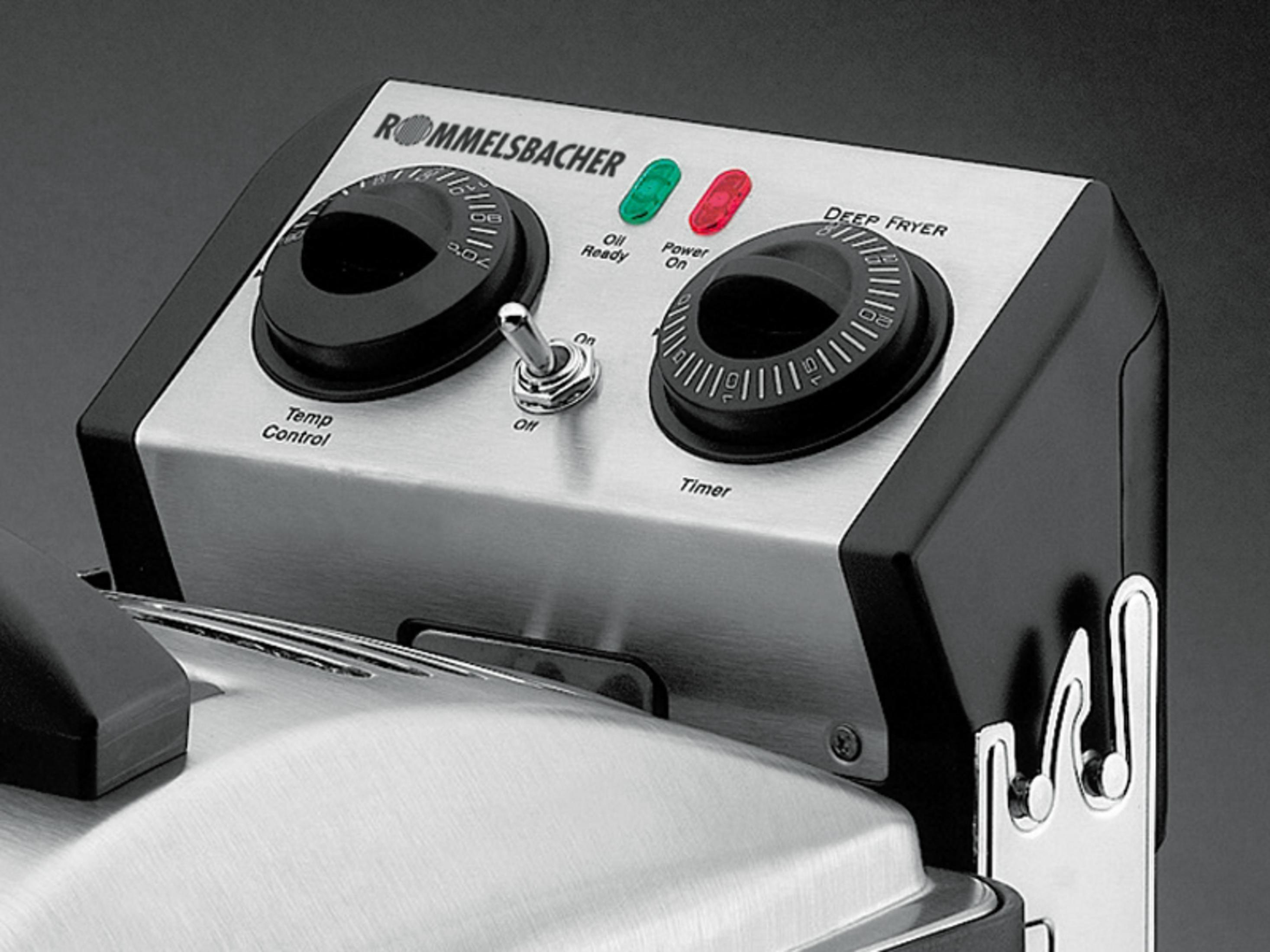 Zbliżenie panelu sterowania frytkownicy Rommelsbacher z pokrętłami.