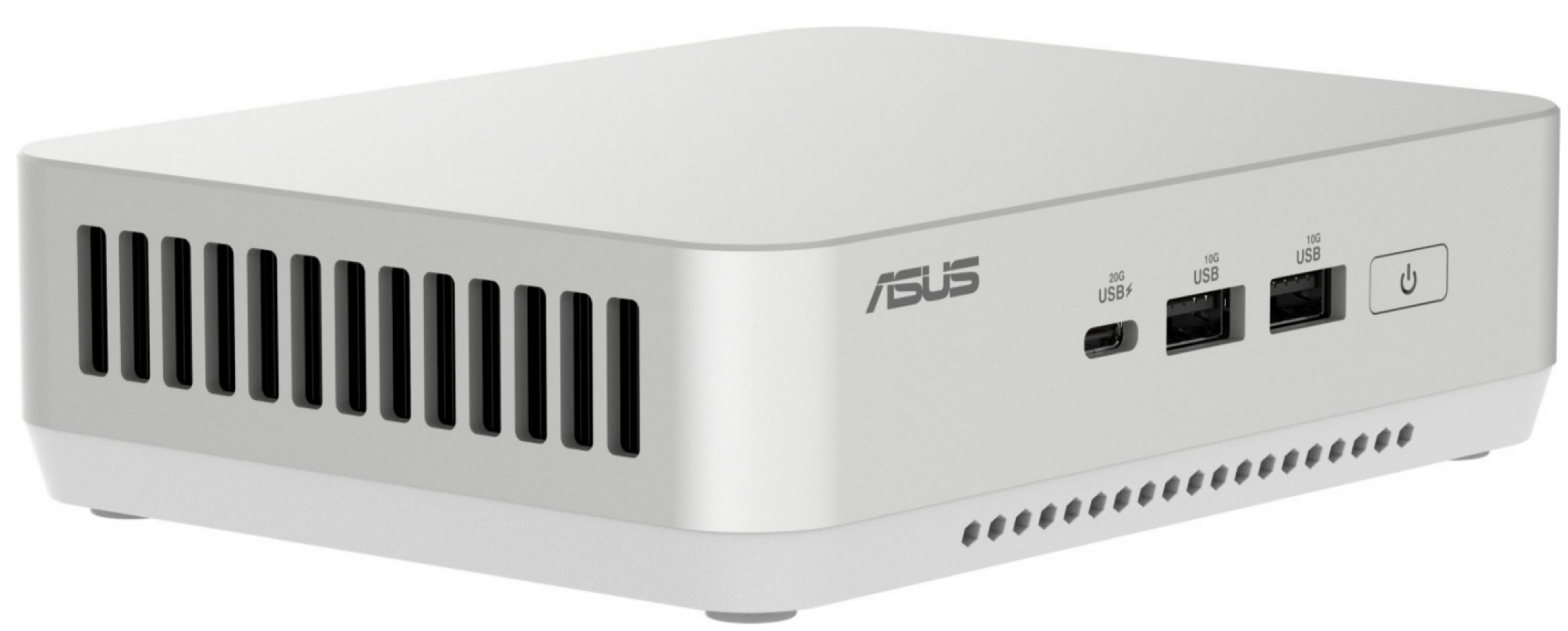 Biały Mini PC ASUS z otworami wentylacyjnymi, portami USB i przyciskiem zasilania.