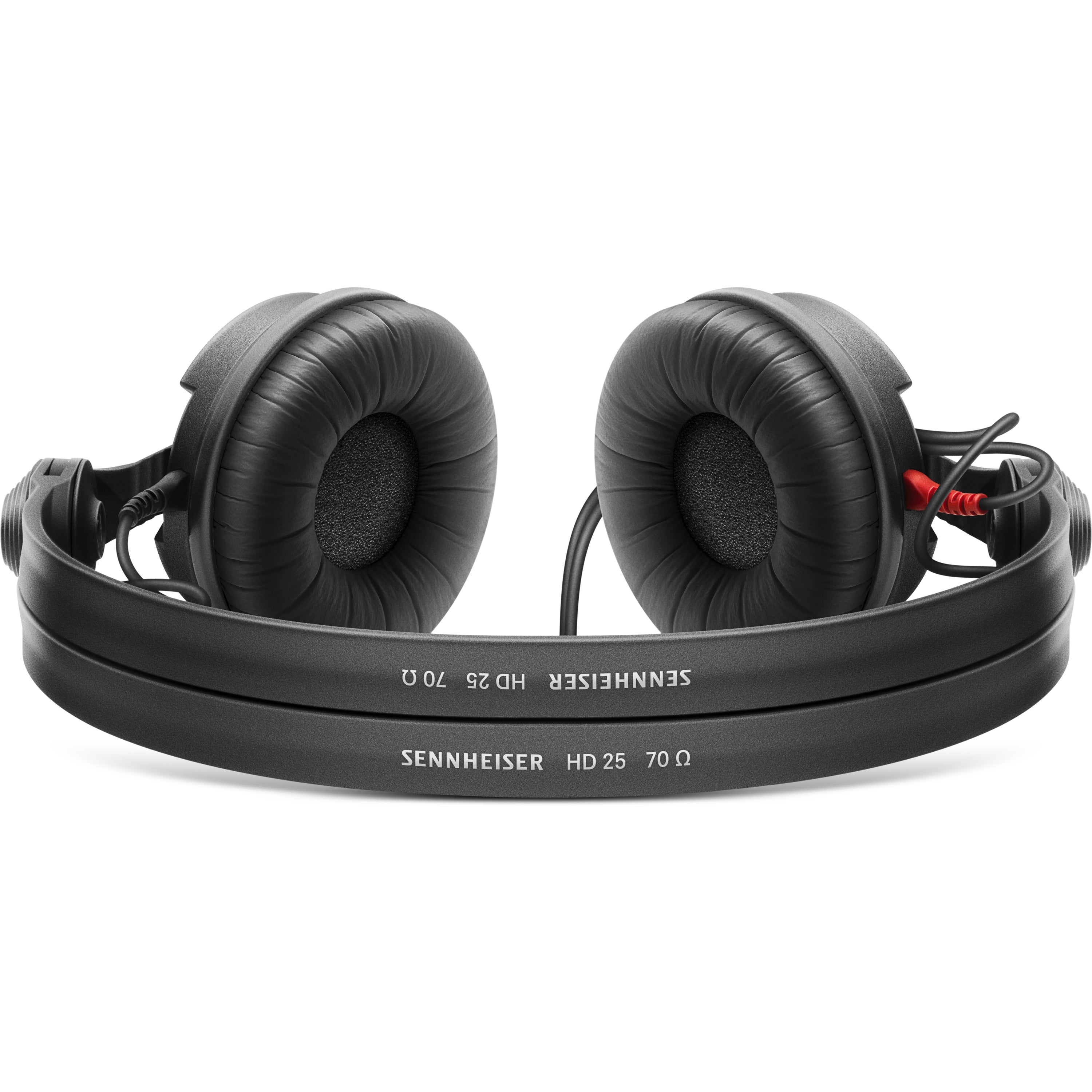 Black Sennheiser HD 25 70 Ω headphones with red cable plug on white background.